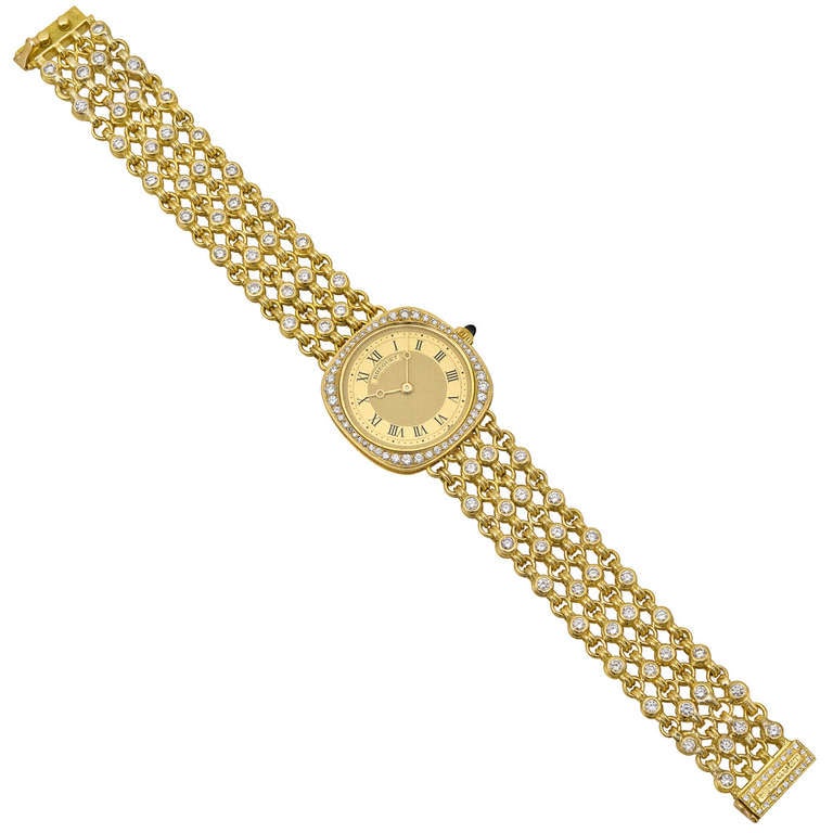 Breguet lady's 18k yellow gold and diamond bracelet watch, featuring a quartz movement, gilt dial with Roman numerals, 24mm cushion case, bezel with a graduating row of round-cut diamonds on an open link, 18k yellow gold bracelet set with round-cut