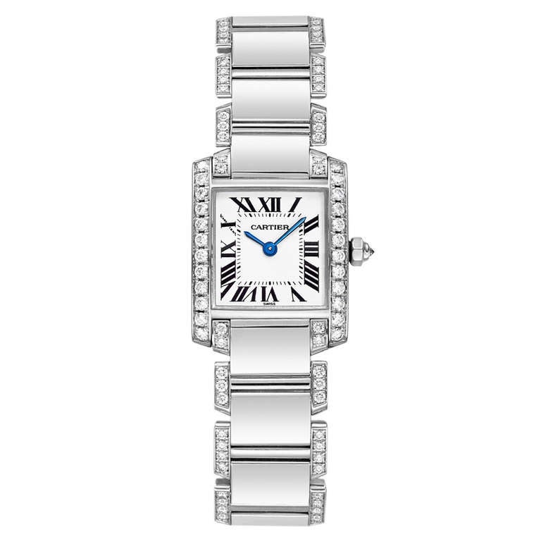 Cartier 18k white gold and diamond Tank Francaise wristwatch with bracelet, featuring a quartz movement, silvered grained dial with black Roman numerals and blued steel sword, 18k white gold case, 26 x 21mm, the bezel and lugs accented by a line of