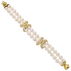 La Triomphe Pearl Diamond Gold Two Strand Bracelet