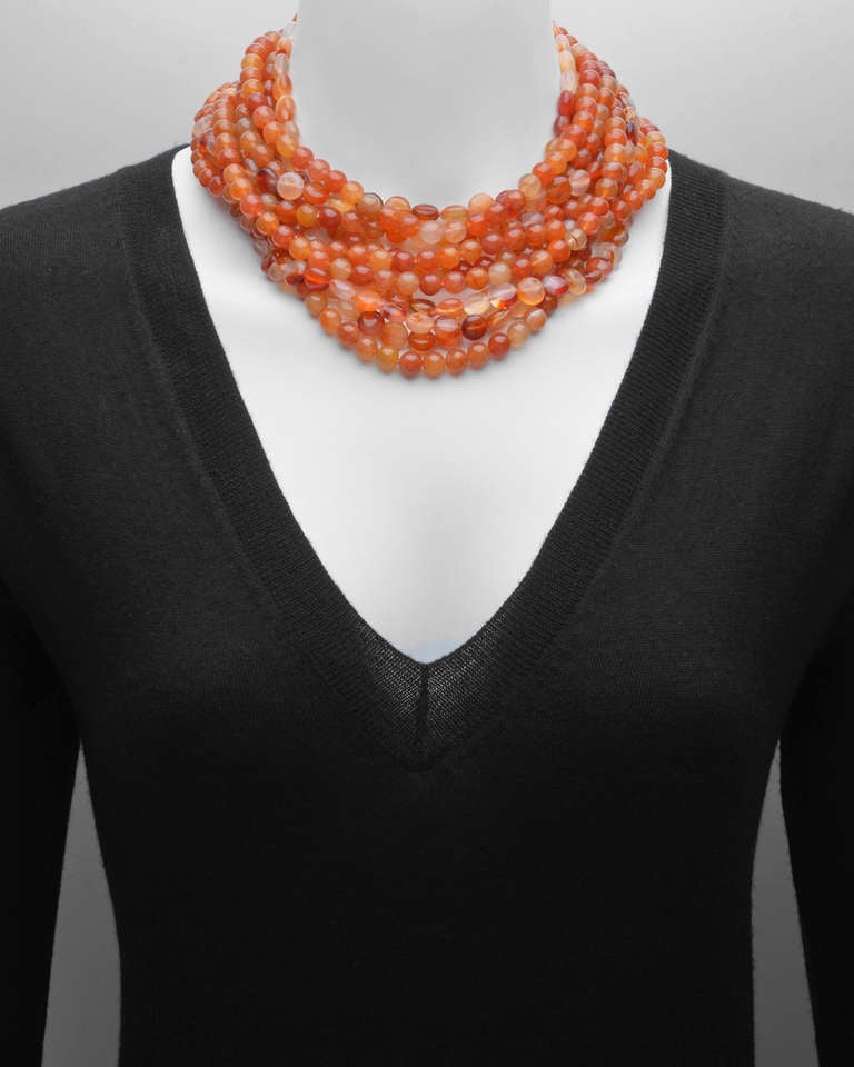 Multicolored carnelian bead necklace, with ten graduated strands measuring between approximately 16 and 18