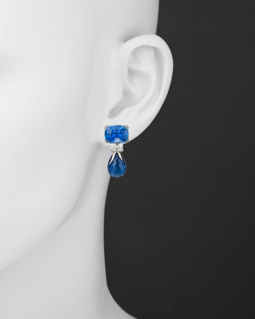 Sapphire and diamond short pendant earrings, designed as a larger cushion-cut sapphire atop a smaller cushion-cut diamond to a pear-shaped briollette-cut diamond pendant, the four sapphires weighing approximately 27.18 total carats and two diamonds