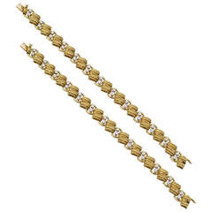 Van Cleef
Arpels Pair of Gold
Diamond Link Bracelets Van Cleef
Arpels Pair of Gold
Diamond Link Bracelets