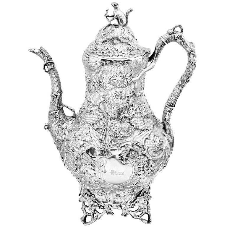 Antique 3-piece tea service in sterling silver, comprising a large teapot, covered milk jug, and covered sugar bowl, in an elegant bucolic pattern depicting a pastoral scene of farmers playing in the garden, marked Ball Black & Co, New York, circa