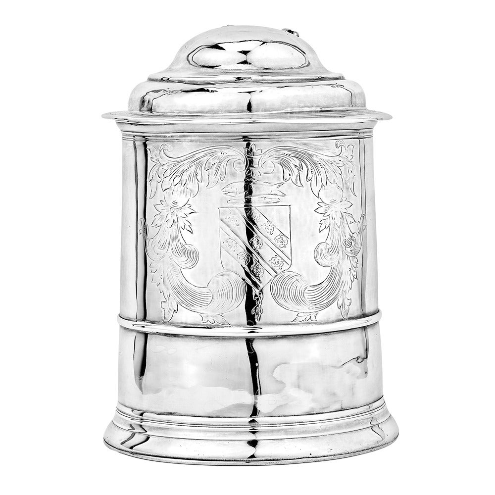 Important early American silver tankard, the front engraved with the Penrose family coat of arms and crest within a scrolling surround, the initials 'PTS' inscribed on the handle along with 'IP', circa 1750, marked Joseph Richardson, Sr. (born in