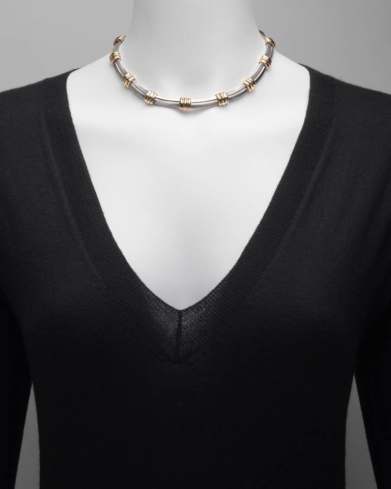 Geometric link collar necklace, designed with alternating fluted oblong links in 18k white gold and chevron-style links in 18k yellow gold, numbered BD9343, signed Bvlgari. 217 grams total weight.