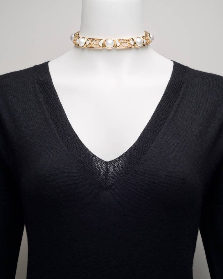 Flexible choker necklace, set with mabe pearl, mother-of-pearl and circular-cut diamonds, the diamonds weighing approximately 6.50 total carats, mounted in 18k yellow gold, signed Marina B.