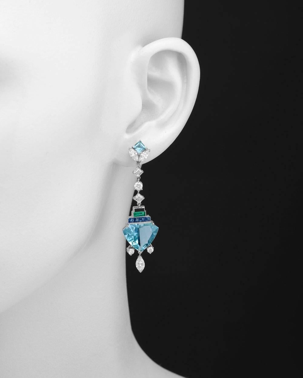 Multicolored gemstone and diamond long drop earrings, showcasing two fine shield-shaped aquamarines weighing 11.57 total carats, accented by sixteen marquise, square and round-cut diamonds altogether weighing 2.55 total carats, as well as eight