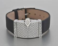 Van Cleef & Arpels Lady's White Gold Diamond Pavé secret Wristwatch