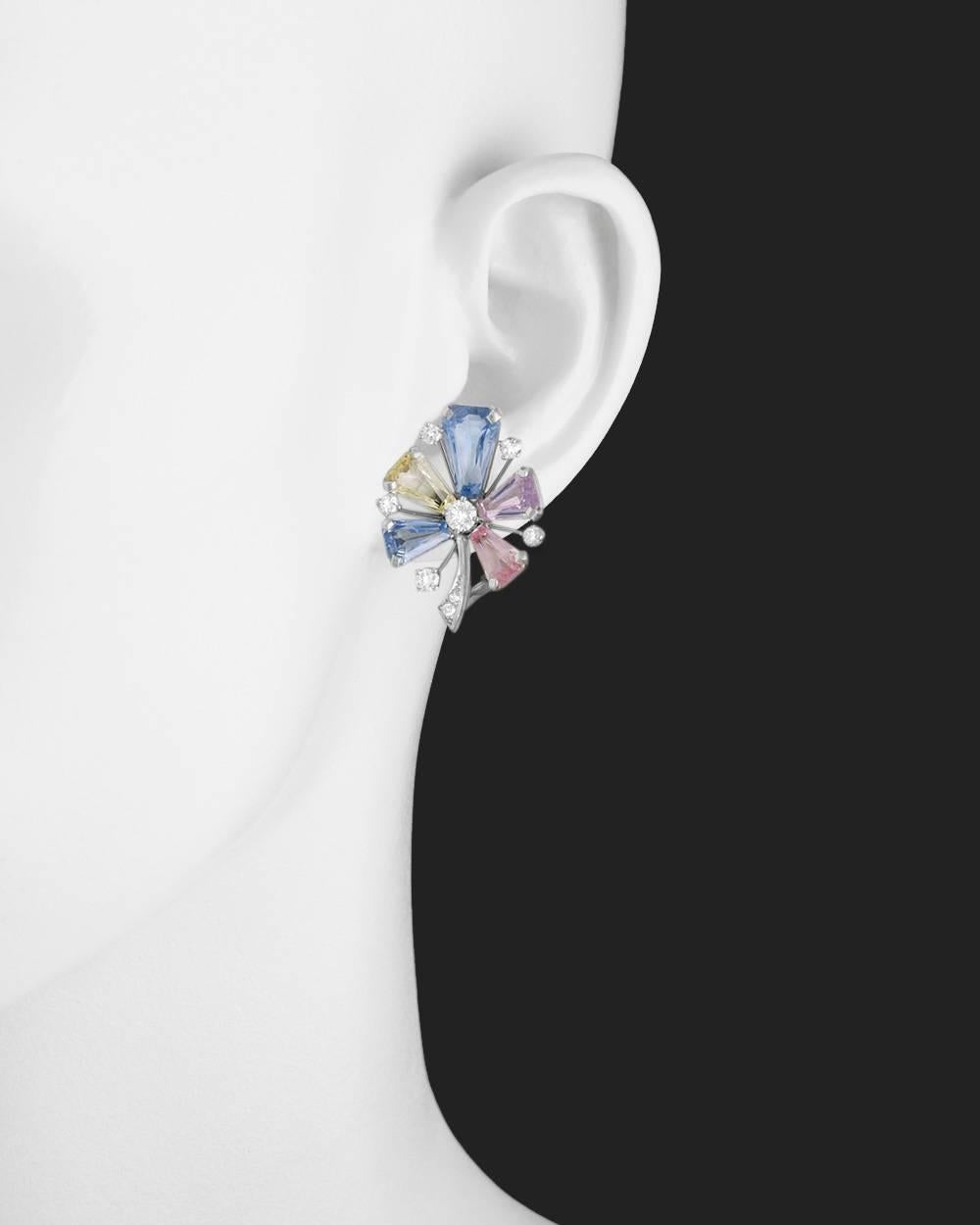 Stylized flower earclips, designed with five multicolored pastel-toned sapphire petals accented by circular-cut diamonds, mounted in platinum, with clip backs, signed 'JEC & Co' for J.E. Caldwell. Ten sapphires weighing approximately 20 total