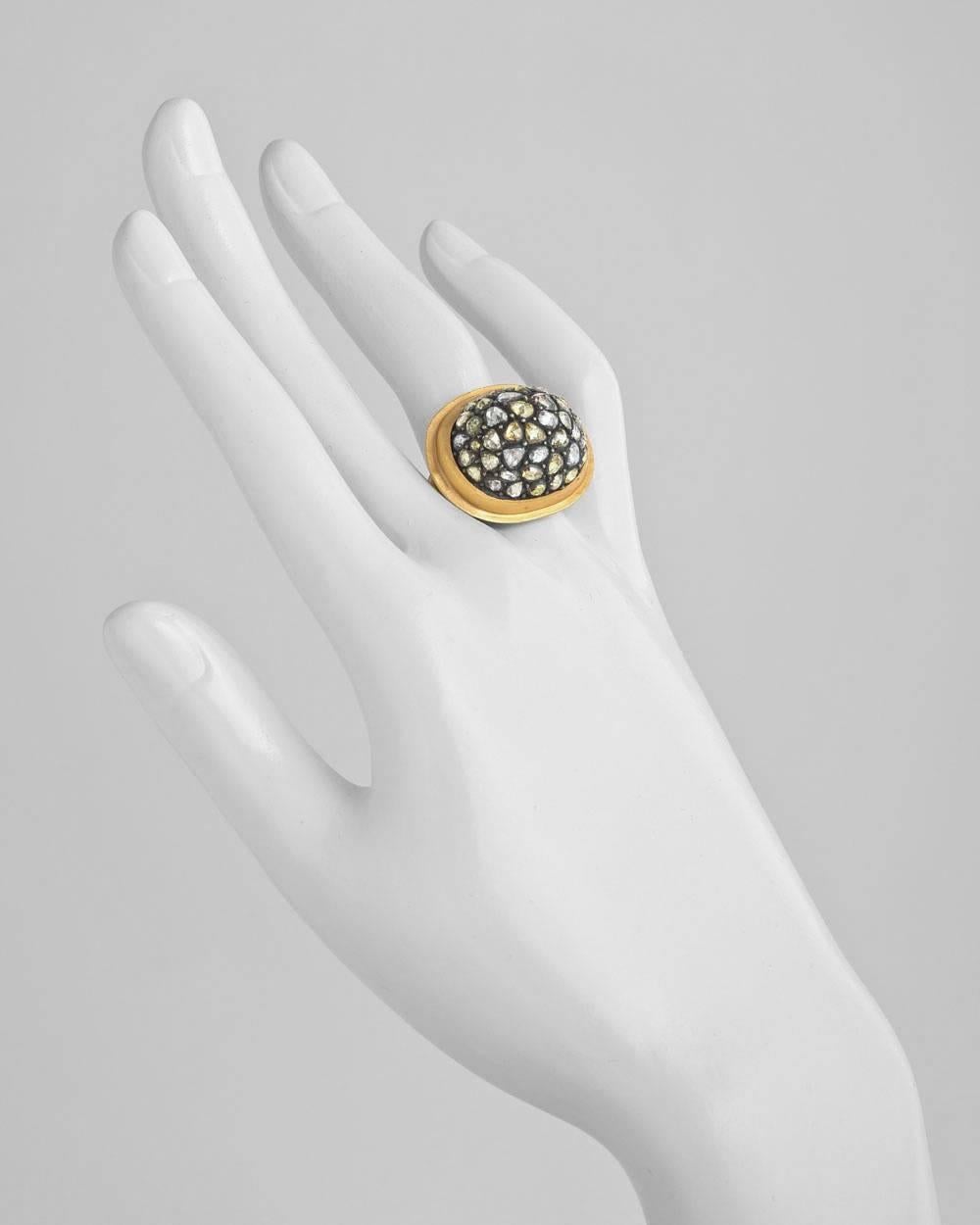 Diamond 'mosaic' dome dress ring, set with muticolored and vari-shaped rose-cut diamonds in oxidized gilver, the ring mounted in hammered 24k yellow gold, stamped Yossi Harari. Size 6.25.