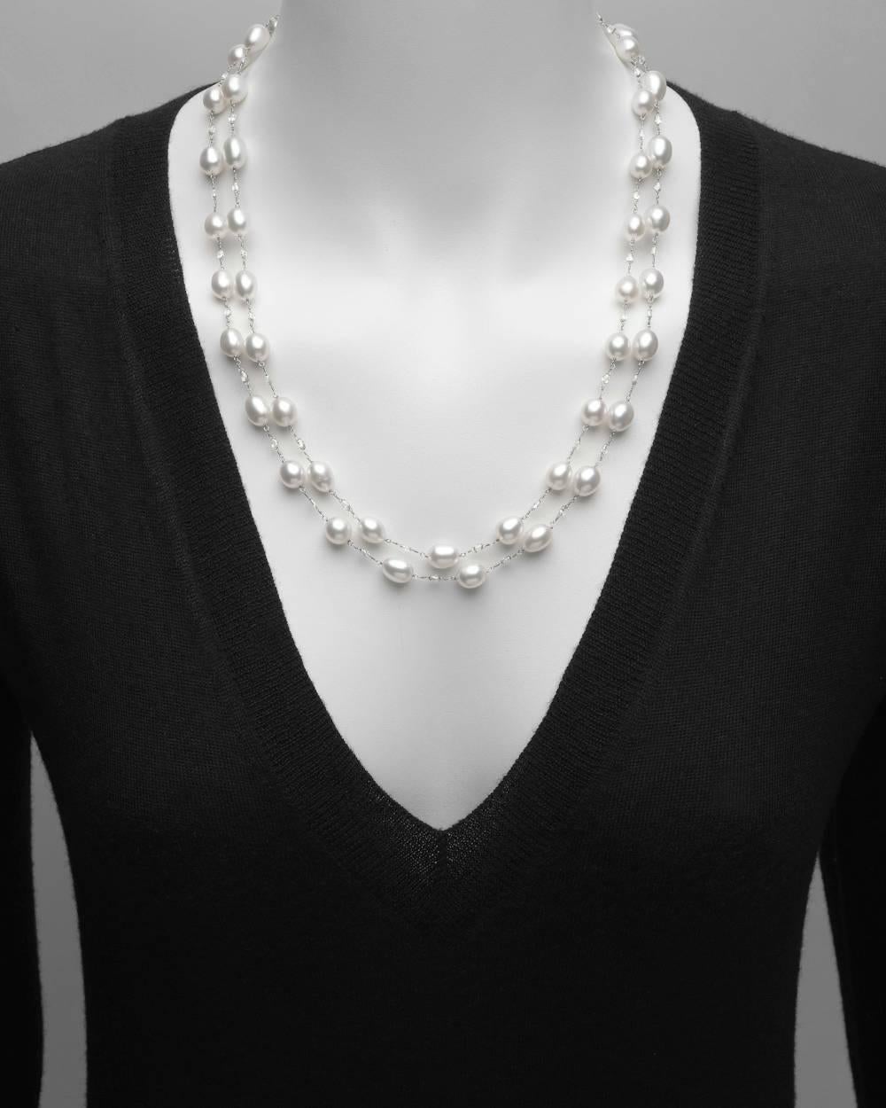 Chain wrap necklace, showcasing Keshi pearls alternating with briolette-cut diamonds, in platinum. Diamonds weighing approximately 7.75 total carats. 45