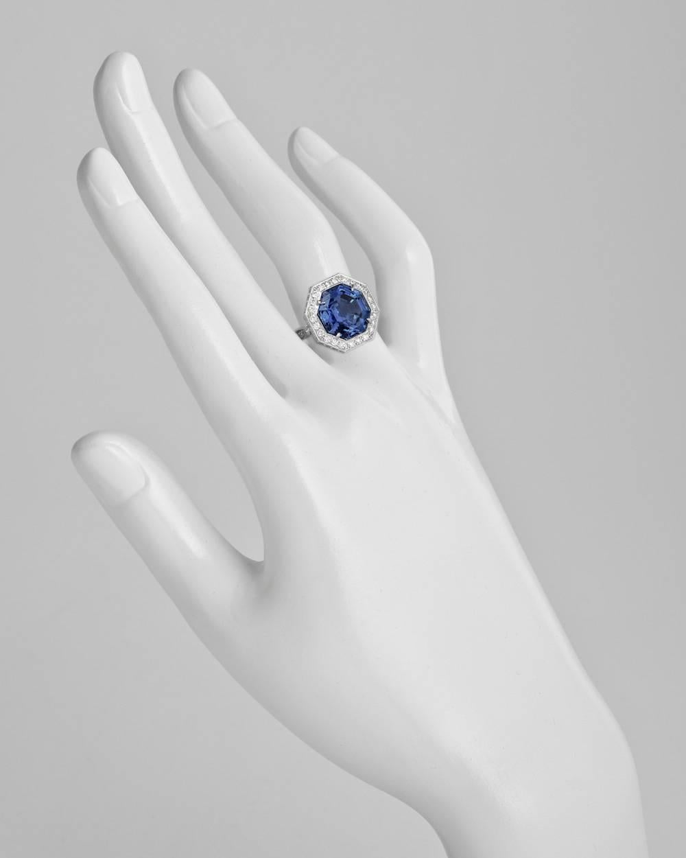 Sapphire cocktail ring, showcasing an octagonal-shaped natural Ceylon sapphire weighing 7.22 carats (certified: no indications of heat treatment), framed by two rows of round-cut diamonds with round-cut diamond-set shoulders, mounted in 18k white