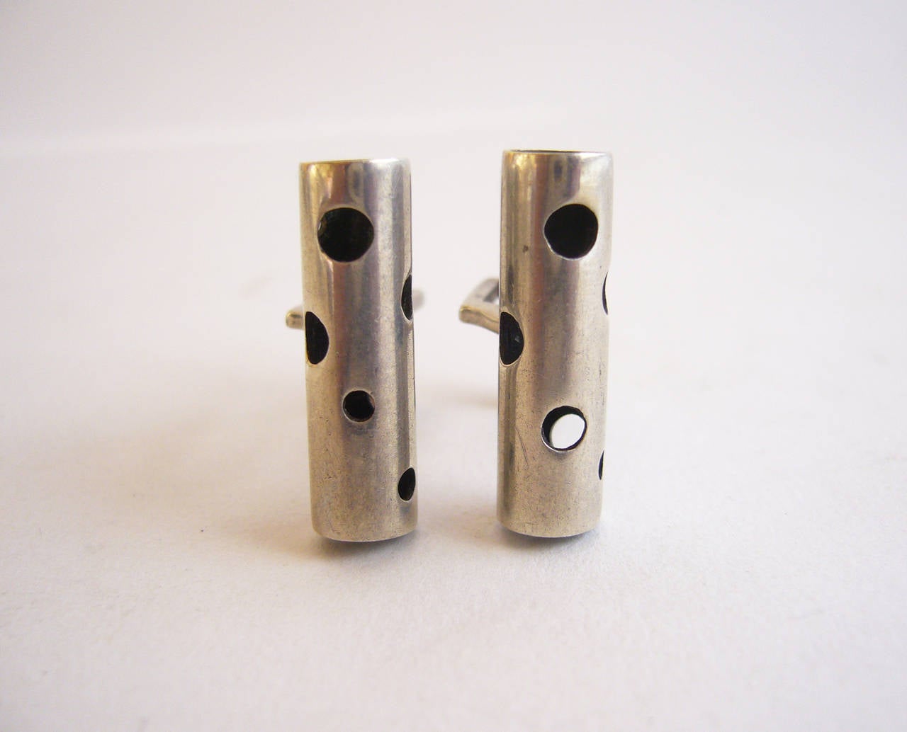 A pair of cufflinks created by Laguna Beach, California jeweler Everett MacDonald, circa 1950's.  Cufflinks measure 7/8