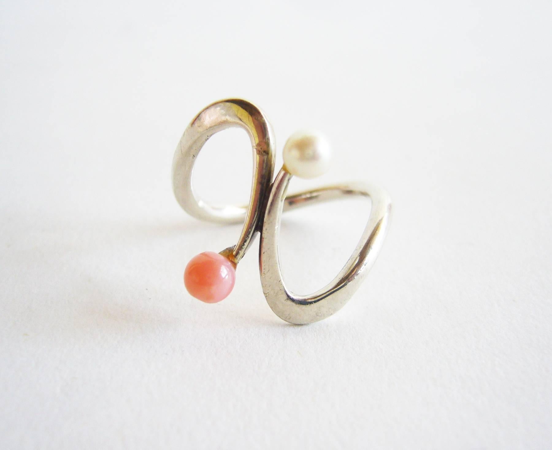 Rare, handmade sterling silver, coral and pearl American modernist ring created by Jack Nutting of San Francisco.  Ring is a finger size 5.5 - 6 and is unsigned.  From the estate of the artist, Jack Nutting.  A great, unconventional alternate to a