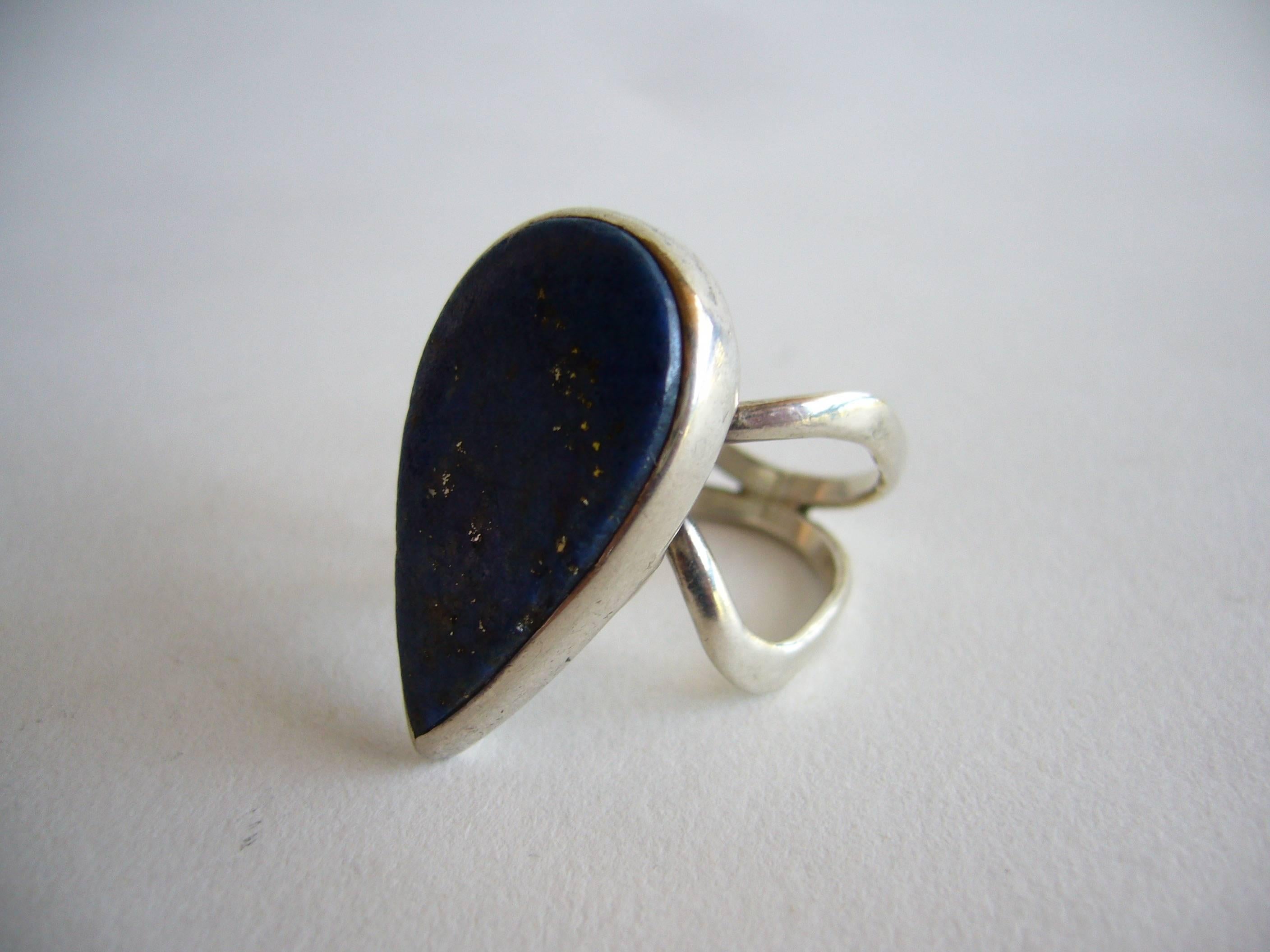 Teardrop lapis lazuli set in sterling silver created by modernist jeweler Jack Nutting of San Francisco, California.  Ring is a finger size 6.5 and its face measures 1 1/8