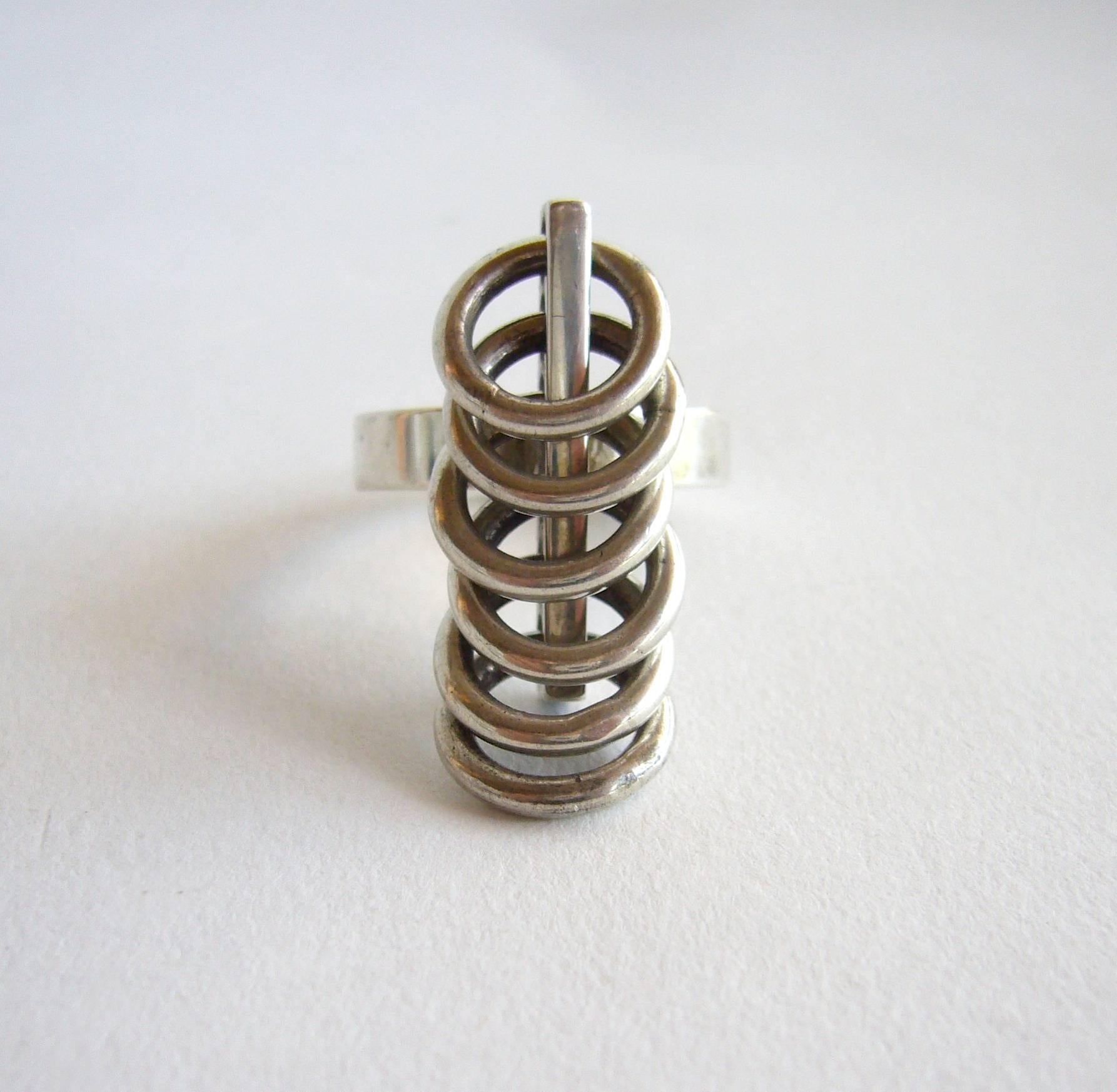 Sterling silver kinetic ring created by Hans Hansen of Denmark.  Ring is s finger size 6 and is signed HaH, 925S, Denmark. In excellent vintage condition.  