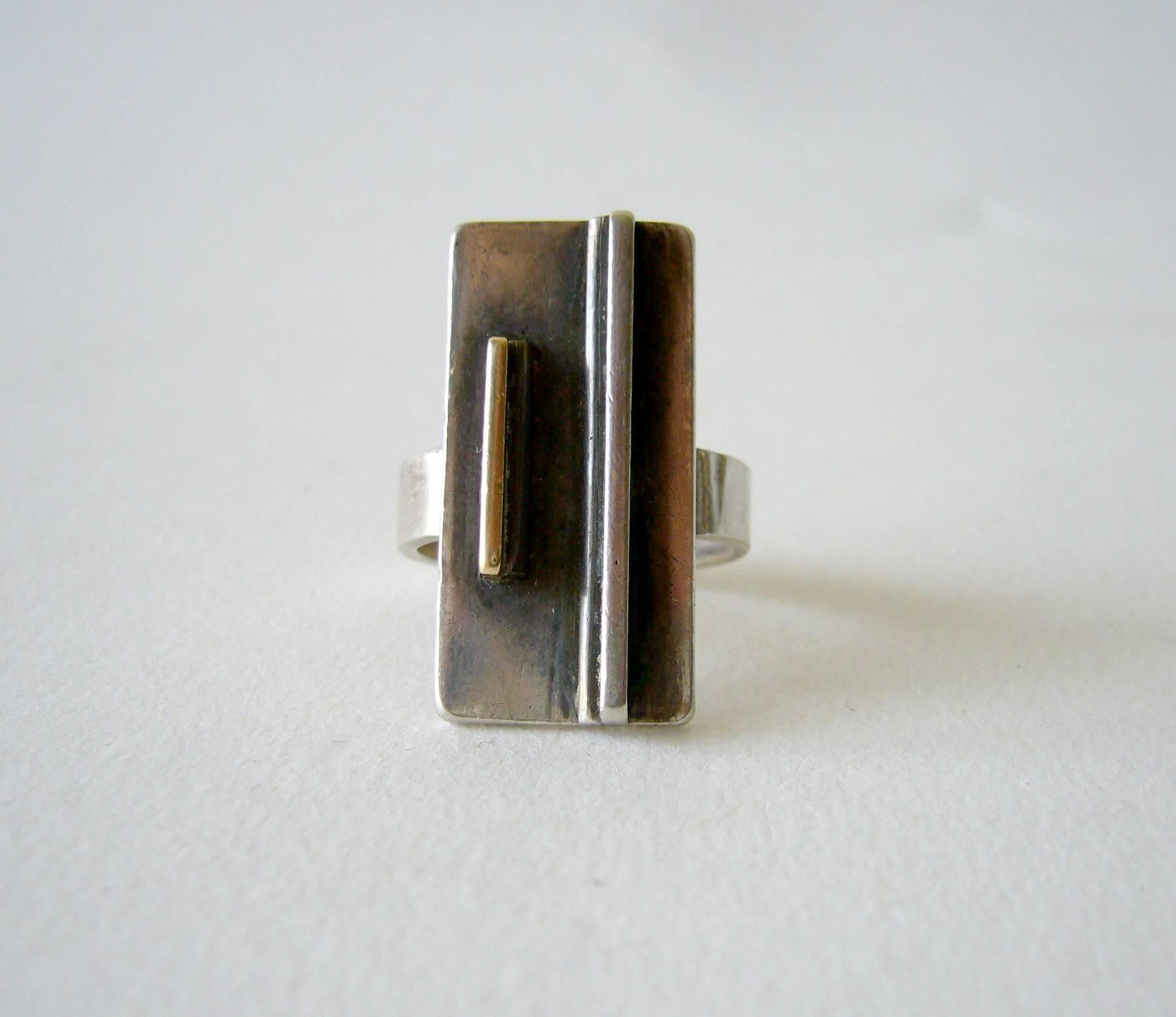 Sterling silver geometric modernist ring created by Nita Lustig of Chicago, circa 1950's.  Face of ring measures 1 1/8