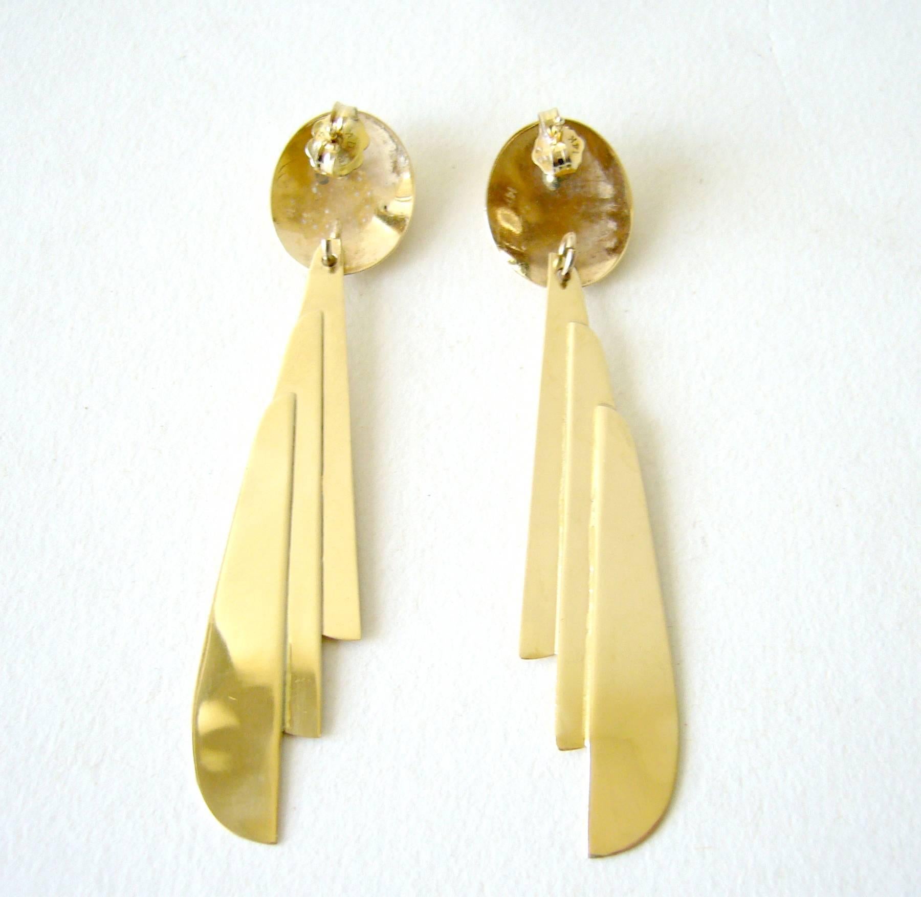 14k gold, light as a feather pierced earrings circa 1970's or 1980's, Disco era.  These earrings measure about 2.75