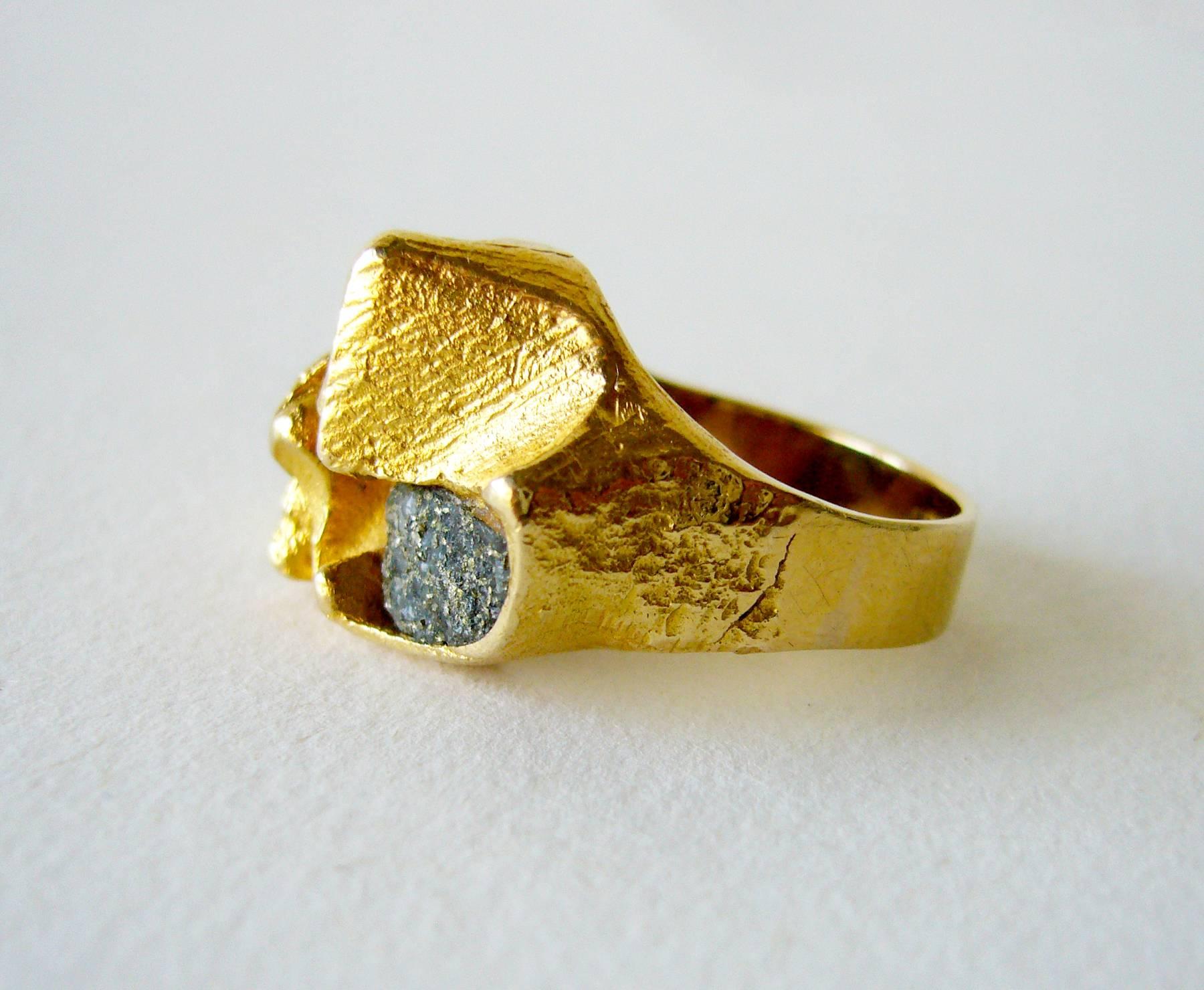 1970's 18K textured gold and copper ore ring designed and created by Master jeweler and sculptor Bjorn Weckstrom of Finland.  Ring is entitled Polyphemus, the giant son of Poseidon and Thoosa in Greek mythology.  Ring is a finger size 6 and is