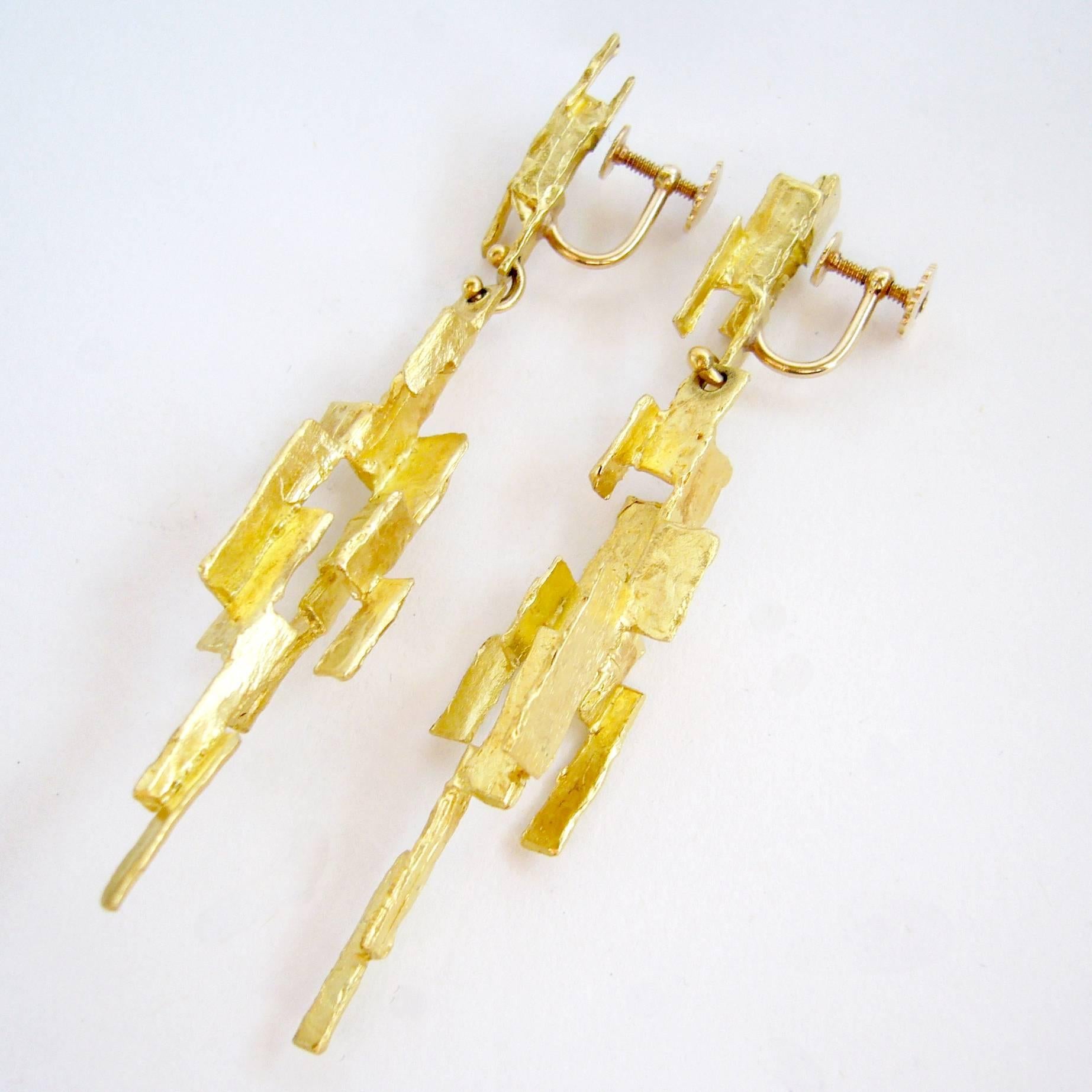 18k gold abstract modernist earrings designed and created by Ed Wiener of New York City, New York.  Earrings are of the screwback variety and can easily be converted for pierced ears.  They measure 3.5