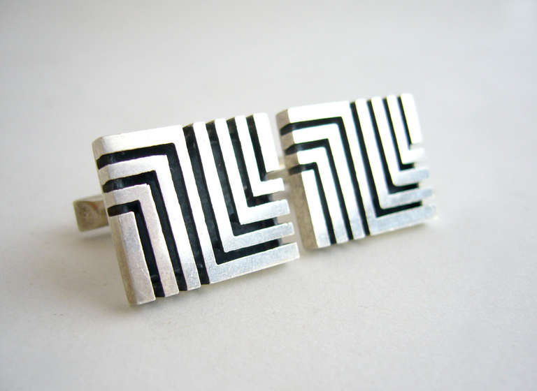 Sterling silver cufflinks created by Harold Fithian of Sunland, California.  Cufflinks feature a cut out maze pattern and are of superior quality.  Signed fi, Sterling on the findings.  Cufflinks measure 1 1/8