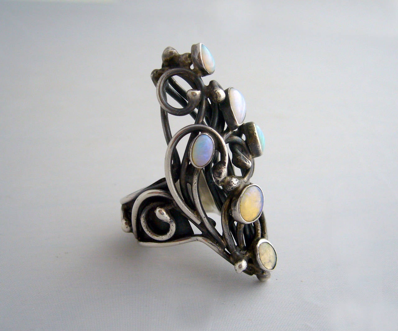 An outstanding opal and sterling silver ring designed by Rachel Gera of Israel.  Face of the ring measures 2.25