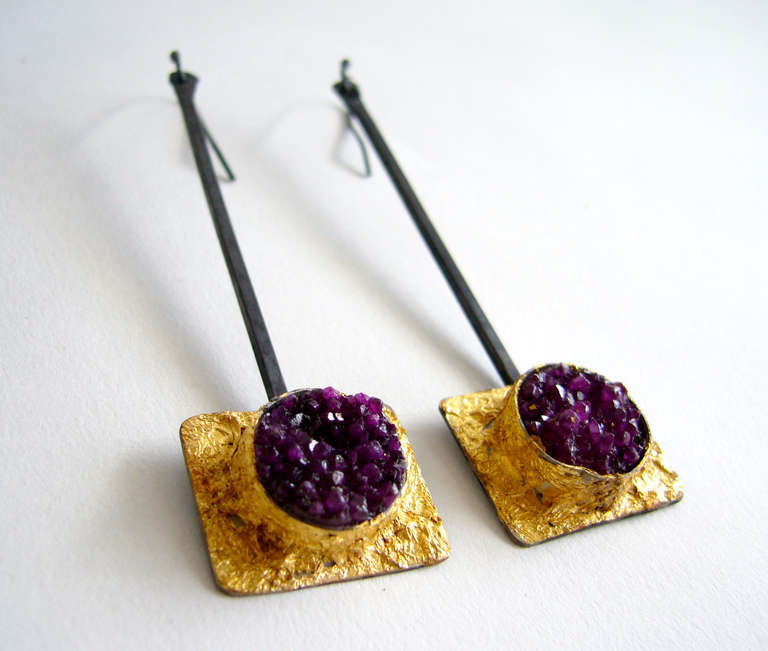 A pair of blackened and gold leafed sterling silver earrings with dyed fall color druzy quartz centers designed and created by Heidi Abrahamson of Phoenix, Arizona.  Earrings measure 3 1/2" in length, including the handmade finding and are