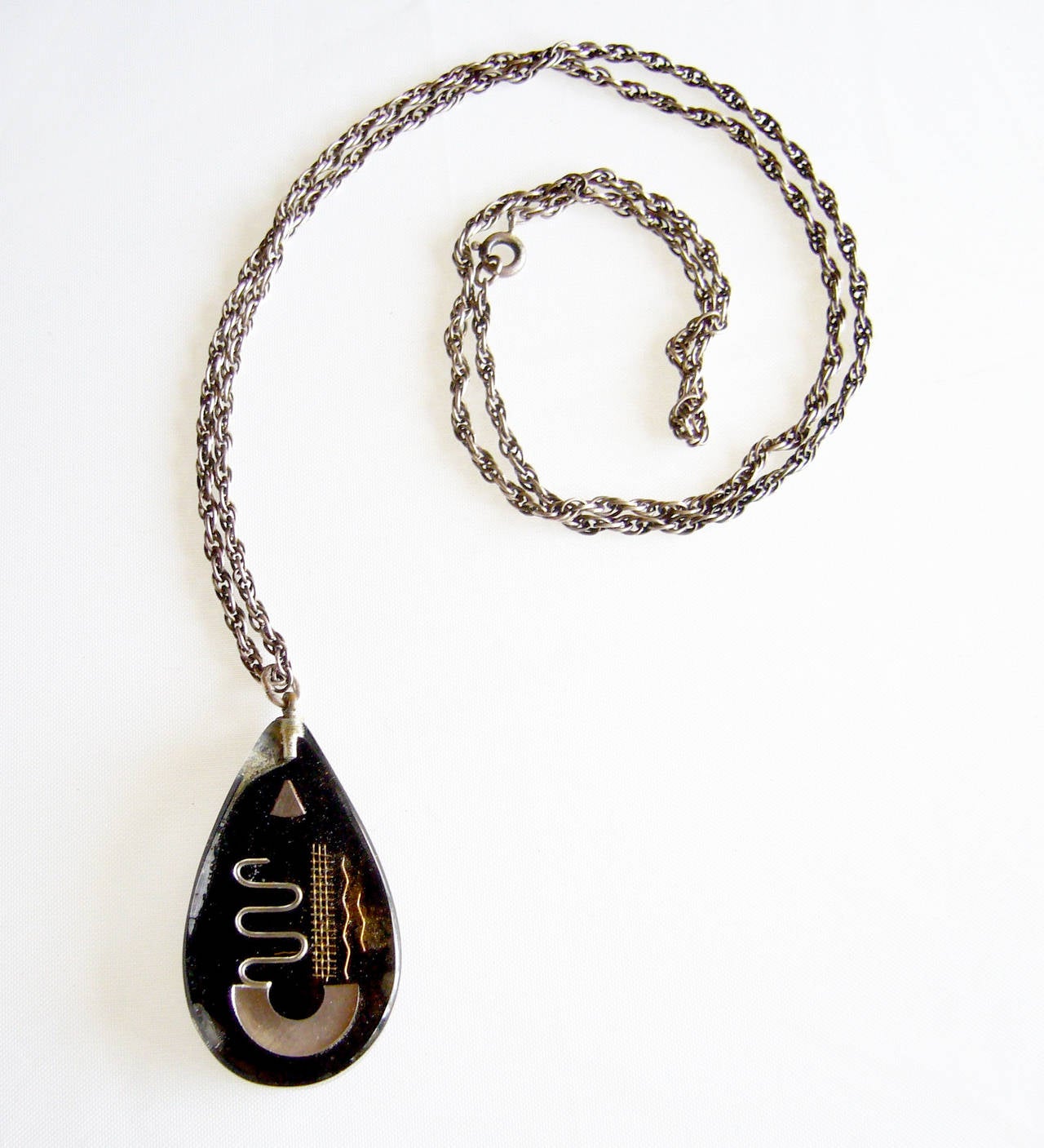 A rare pendant necklace created by Zahara Schatz of Israel. Schatz exhibited and won prestigious prizes in the U.S. and Europe, including the Milan Triennale and The Museum of Modern Art in New York, where she was recognized for a 1951 lamp design.