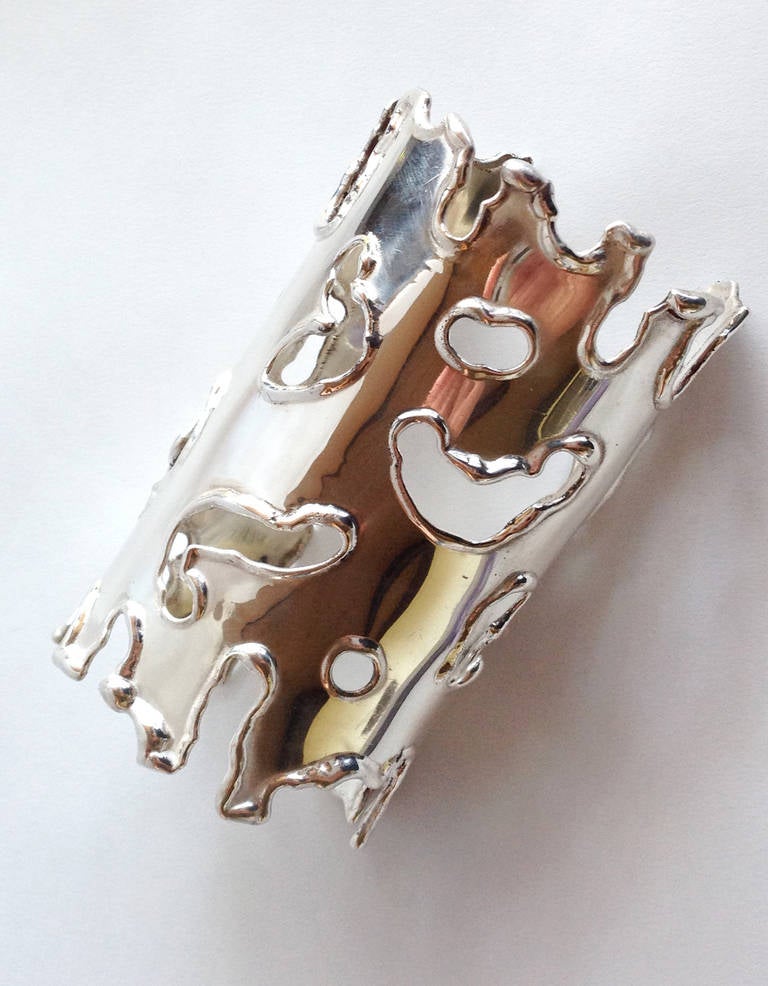 A sterling silver brutalist cuff bracelet attributed to Arthur King.  Cuff measures 4.5