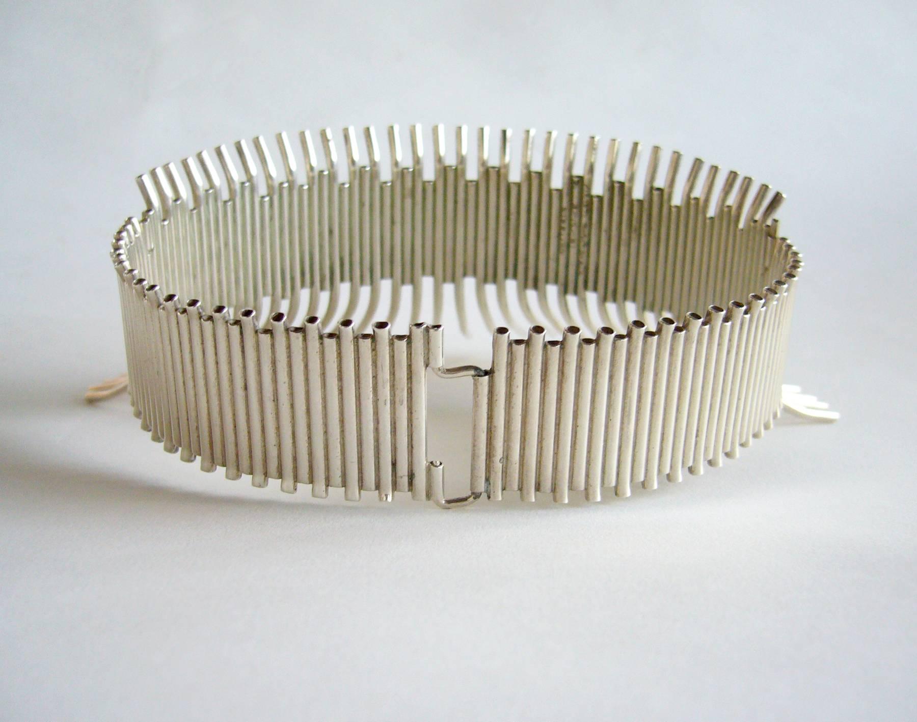 Sterling silver tube collar necklace created by Aaron Rubinstein of Cincinnati, Ohio.  Necklace has a wearable neck length of 15