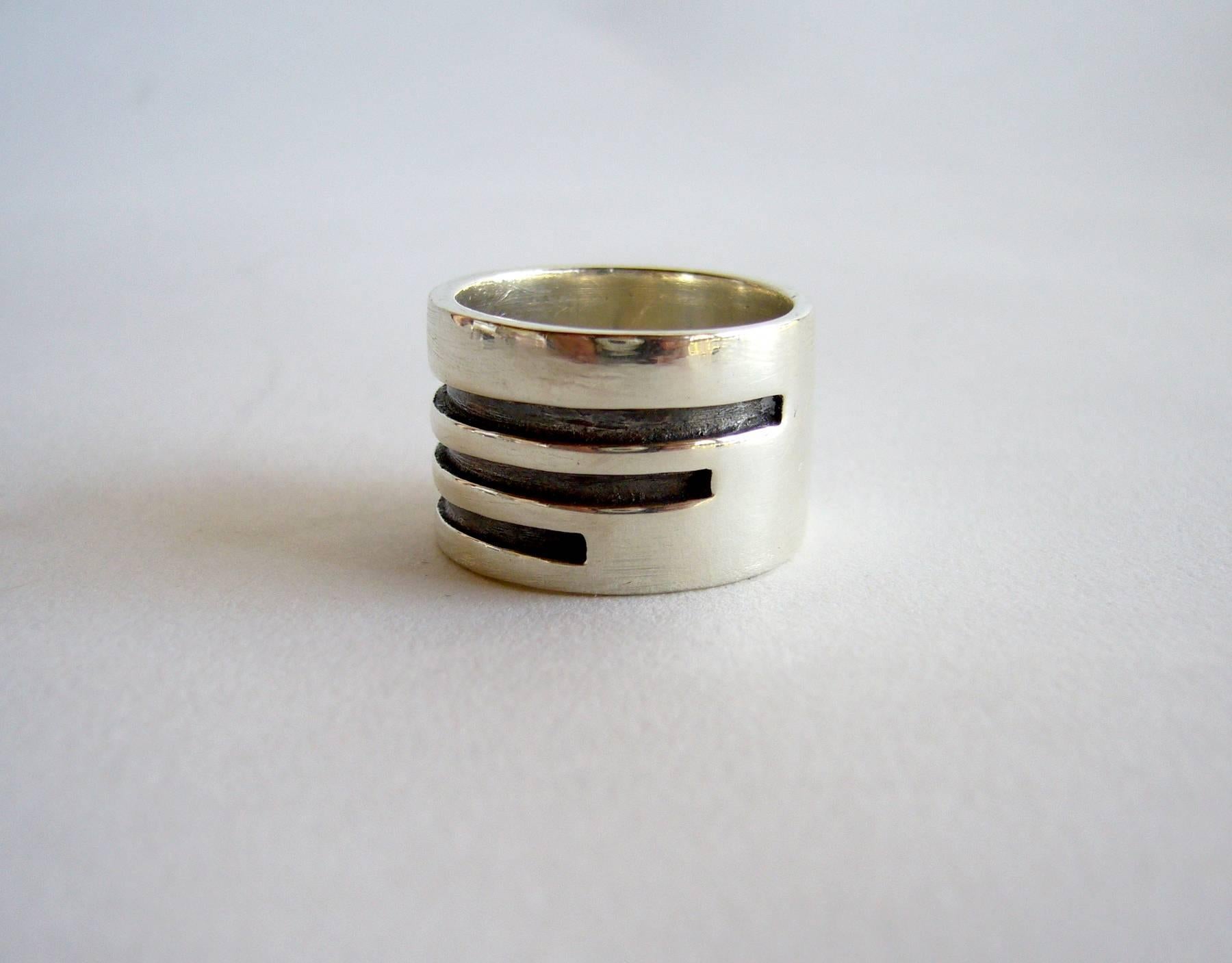 Sterling silver ring created by Idella La Vista of New York City, New York. Ring is a finger size 8.5 and suitable for a man or woman.  It measures 5/8