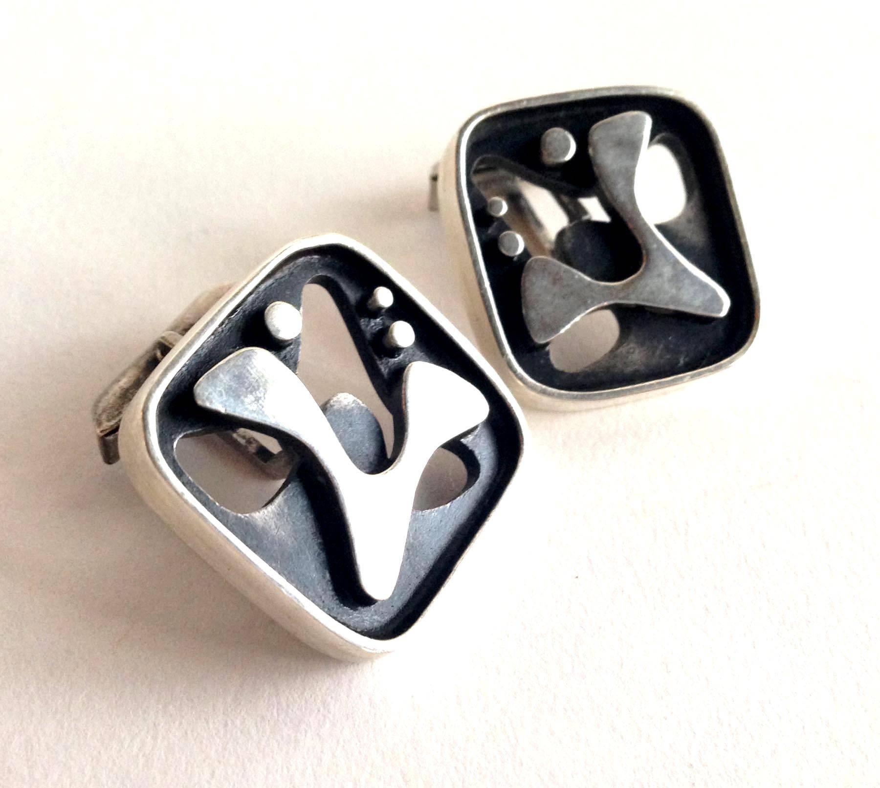 Abstract modern bi-level, shadowbox cufflinks by California modernist jeweler, Everett MacDonald of Laguna.  These cufflinks are a rare example of MacDonald's work and date from the 1950's.  Measuring 1