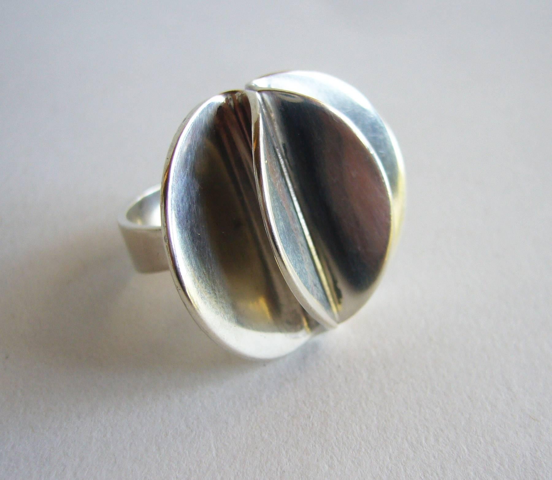 Sterling silver petal ring created by Theresia Horvselv for Alton of Sweden.  Ring is a finger size 4.5 and can easily be resized if need be.  A great, unconventional alternate to a modern day engagement or wedding ring.  Signed Theresia, Alton,