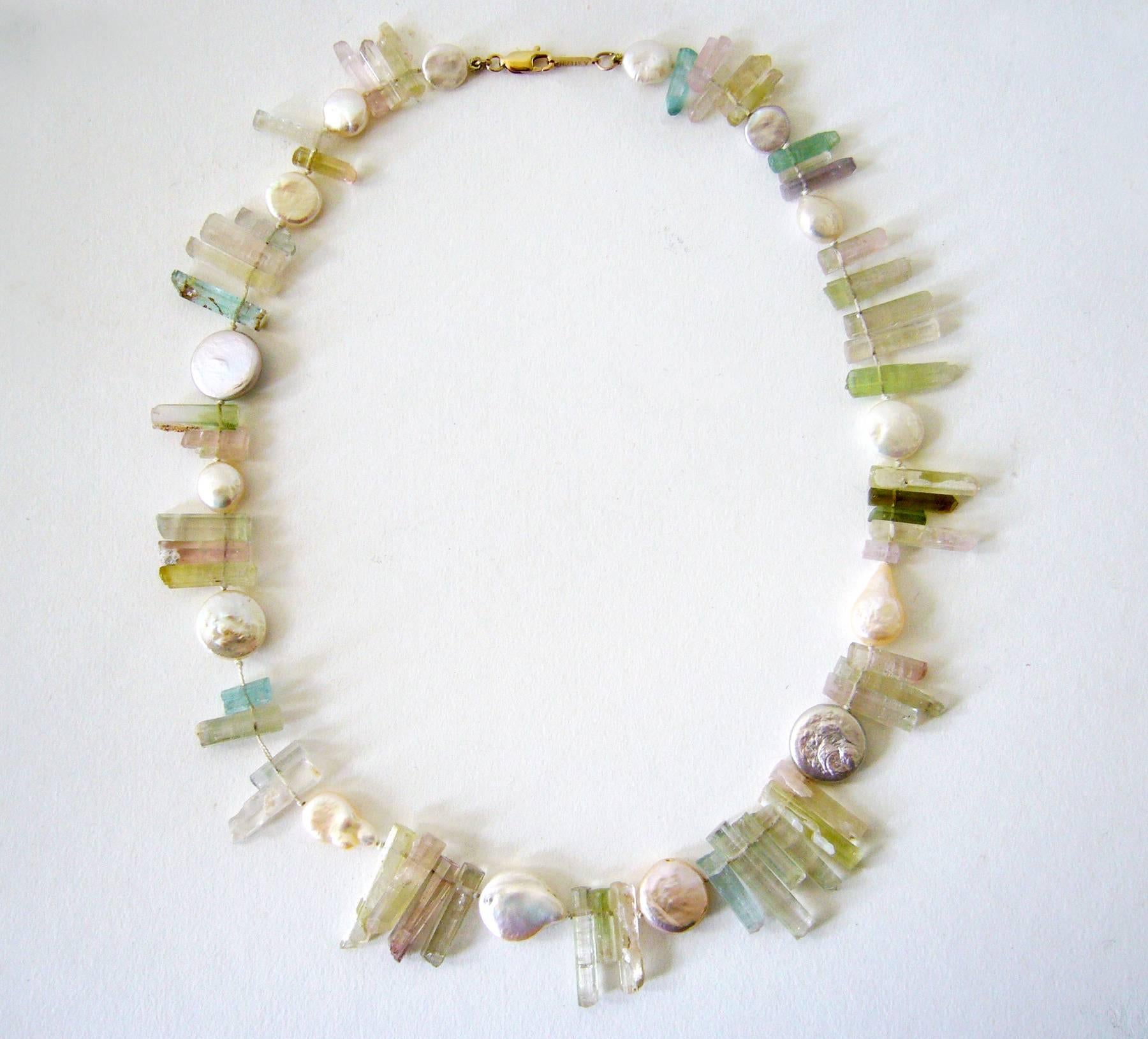 Natural gemstone crystal and mother of pearl hand strung necklace designed by Allison Stern of San Francisco, California.  Necklace measures 18" in length and is signed Allison Stern on tag at clasp.  In excellent vintage condition.  