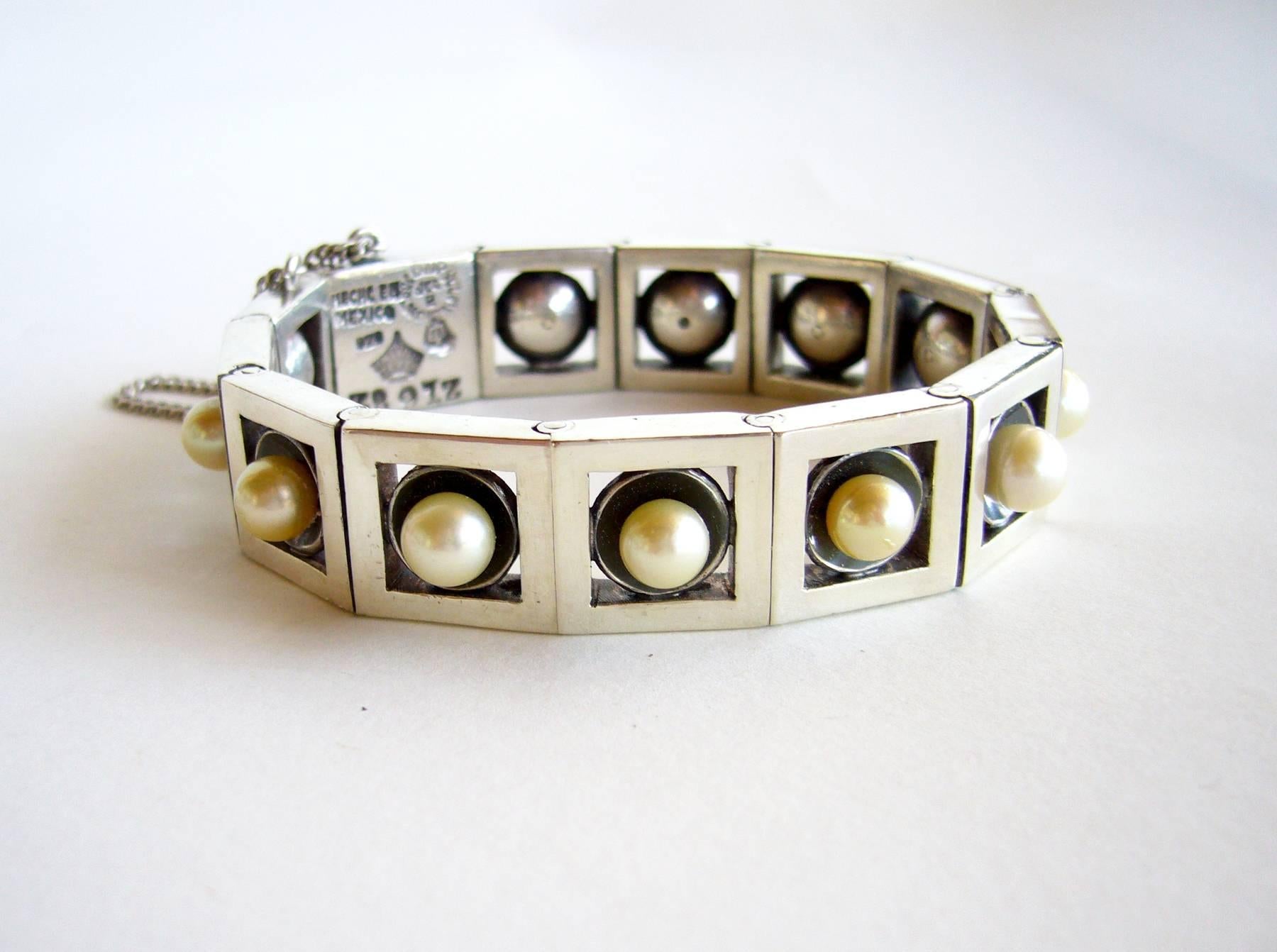 Sterling silver and pearl Mexican modernist bracelet created by Antonio Pineda of Taxco, Mexico.  Nicely weighted bracelet measures 8.25