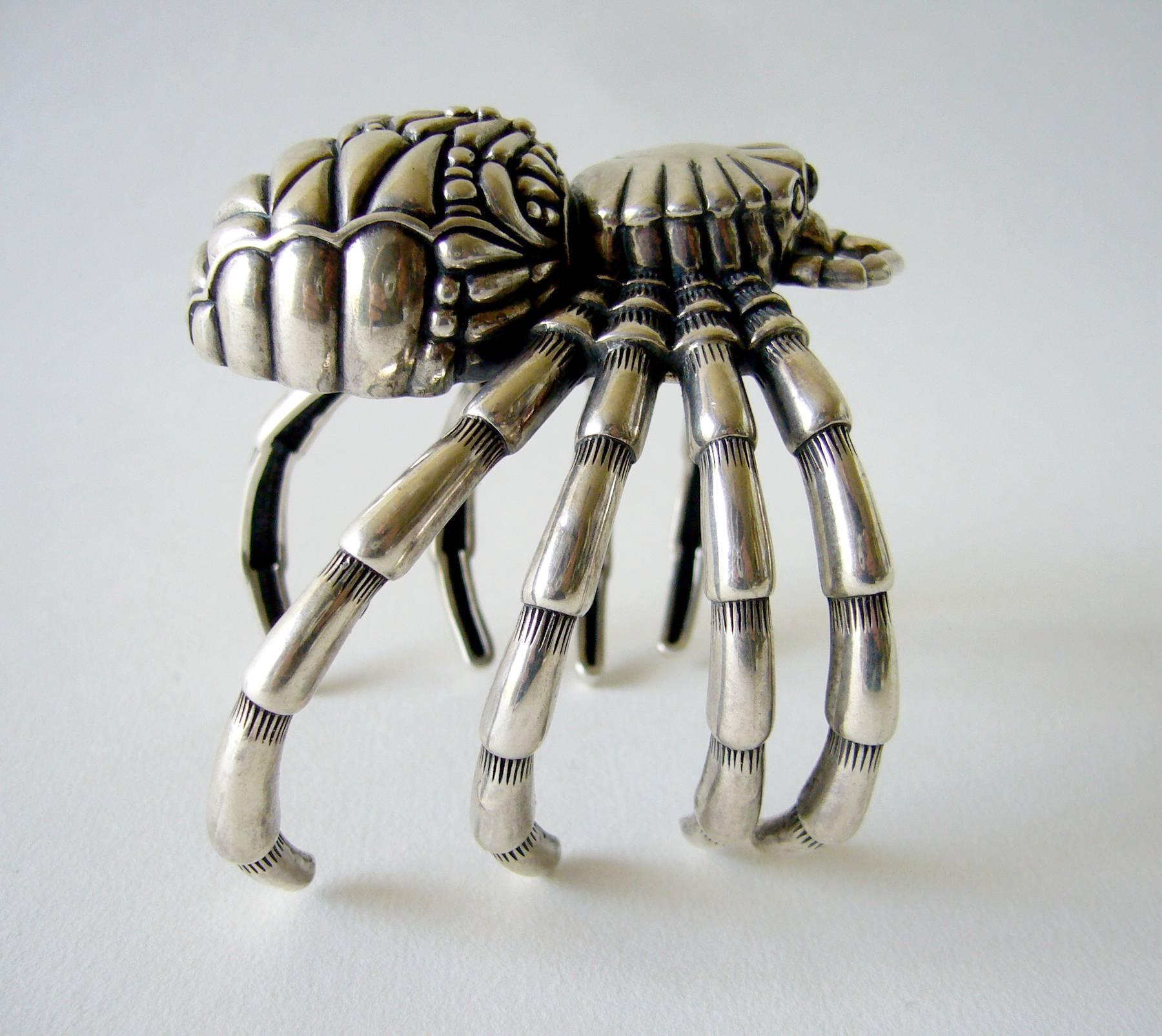 Large scale sterling silver tarantula cuff bracelet, circa 2000's.  Fine detailing overall and featuring hematite eyes.  Bracelet will fit a medium to large wrist and arm.  Wearable wrist length of about 7.75