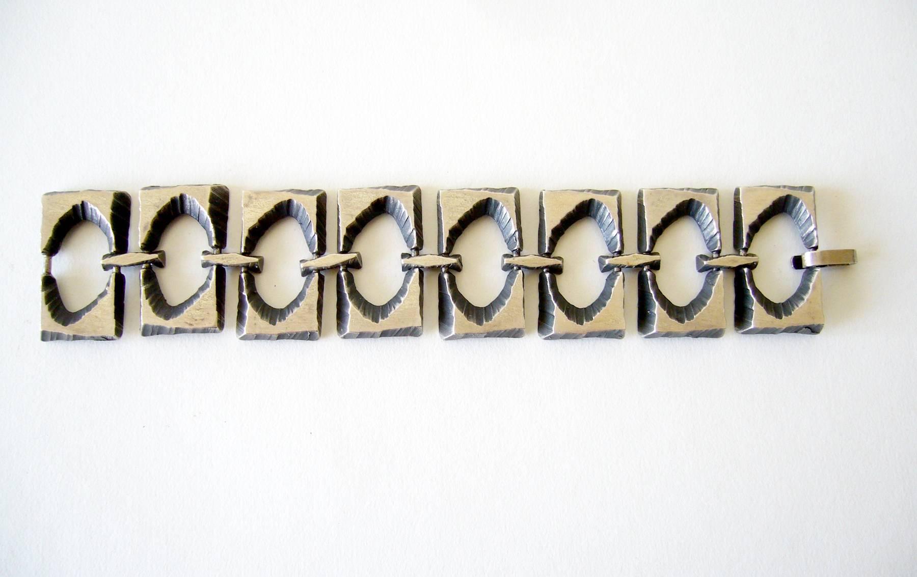 Sterling silver modernist bracelet by Karl Laine and Hans Sten of Finland.  Bracelet has eight rectangular brutalist panels linked together for a great rocker look. Bracelet measures 8