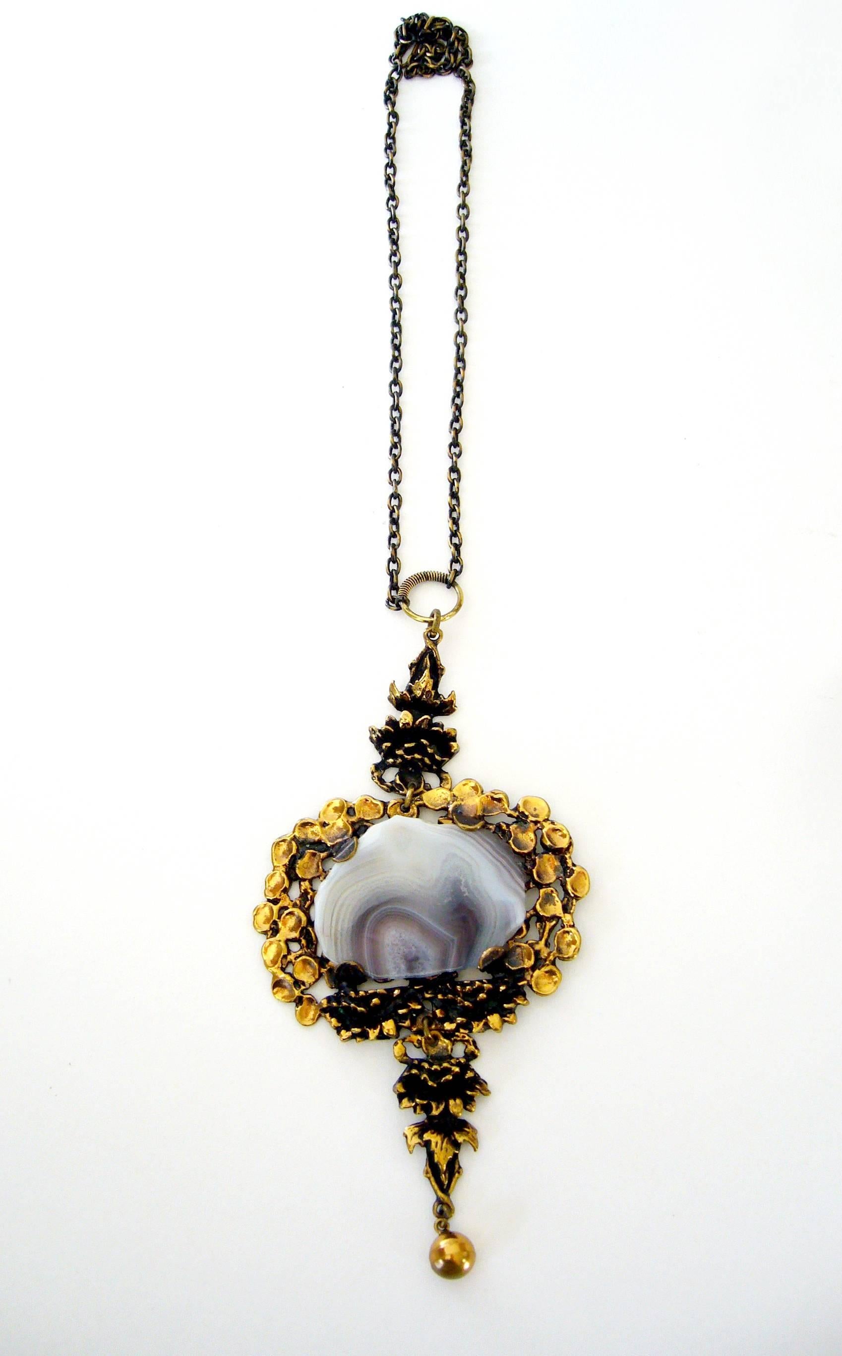 Large scale bronze necklace with slice agate featured at center created by Pentti Sarpaneva of Finland.  Pendant measures 7