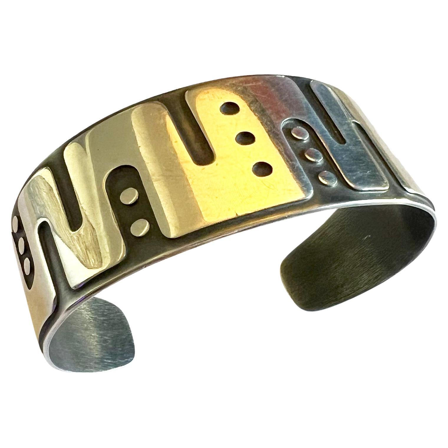 Bracciale modernista americano in argento sterling creato da Jay Tuttle, circa anni '60. Il bracciale misura 1,25