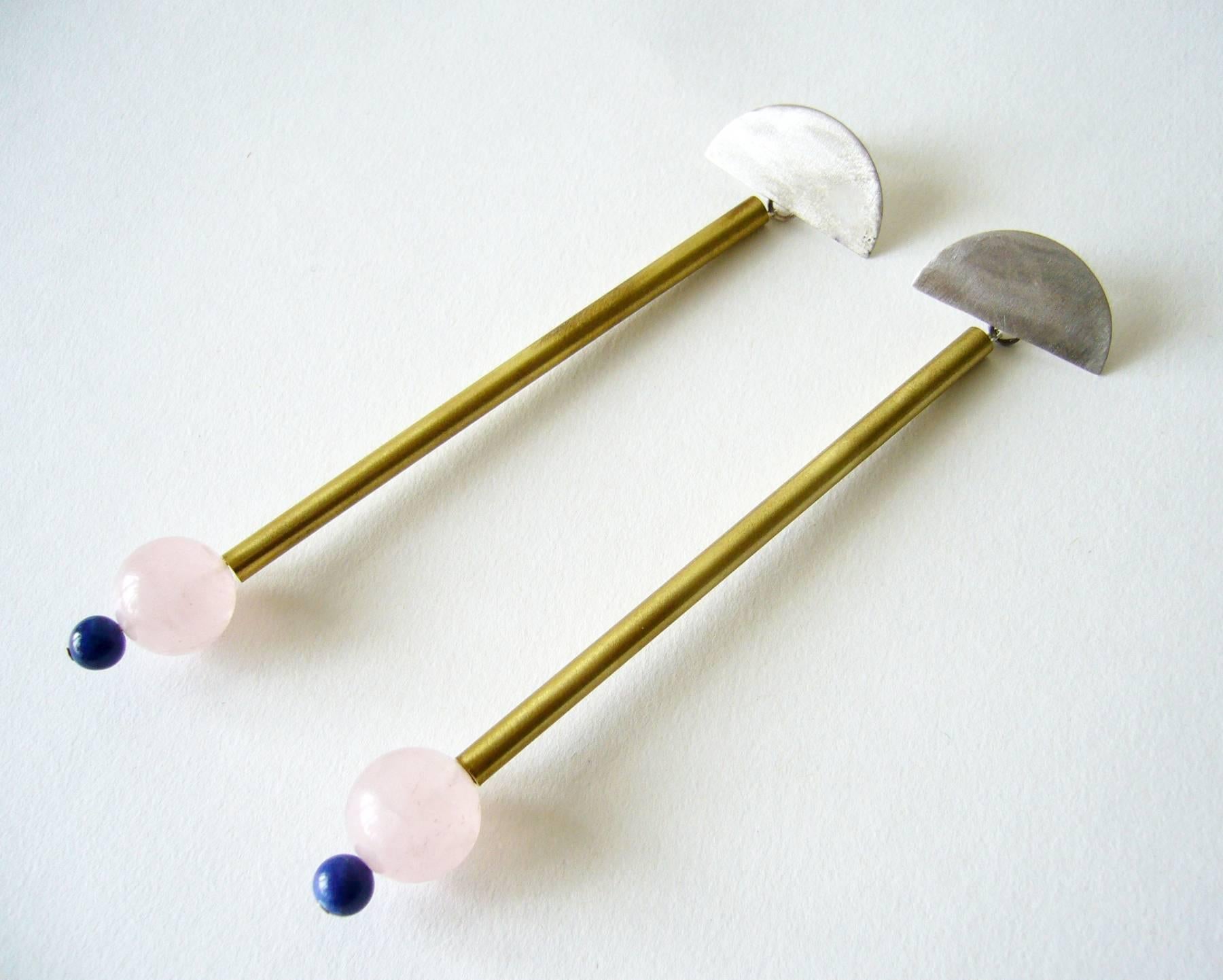 Sterling silver, brass, lapis lazuli and rose quartz earrings created by Heidi Abrahamson of Phoenix, Arizona.  Earrings are part of a new Post Modernist architectural series that Abrahamson is exploring.  They measure 4.5