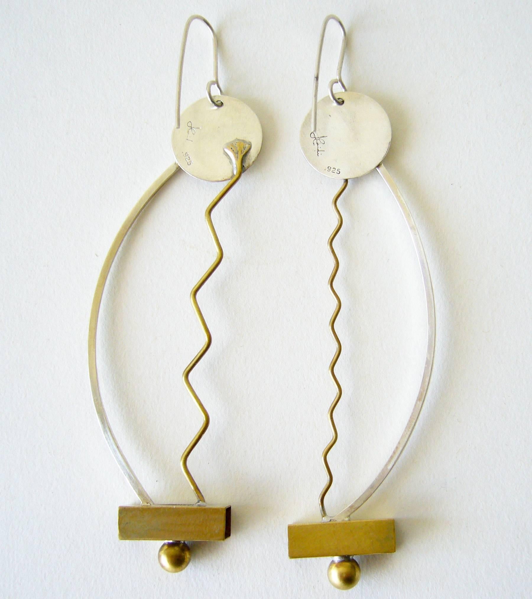 Sterling silver and brass post modernist style pierced earring created by Heidi Abrahamson of Phoenix, Arizona.  Earrings measure 4.5