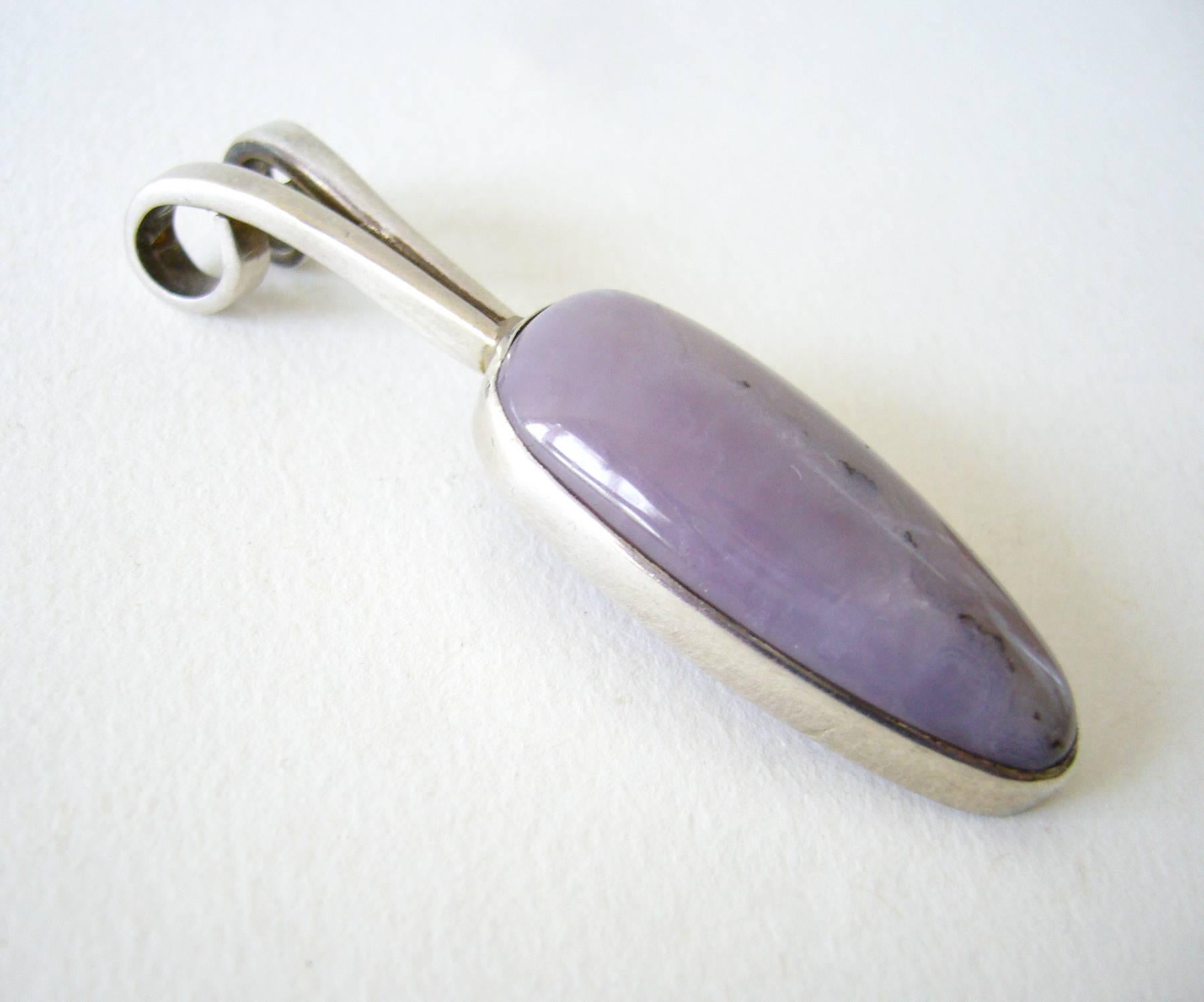 Lavender agate pendant set in sterling silver created by jeweler Jack Nutting of San Francisco, California.  Pendant measures 2 5/8