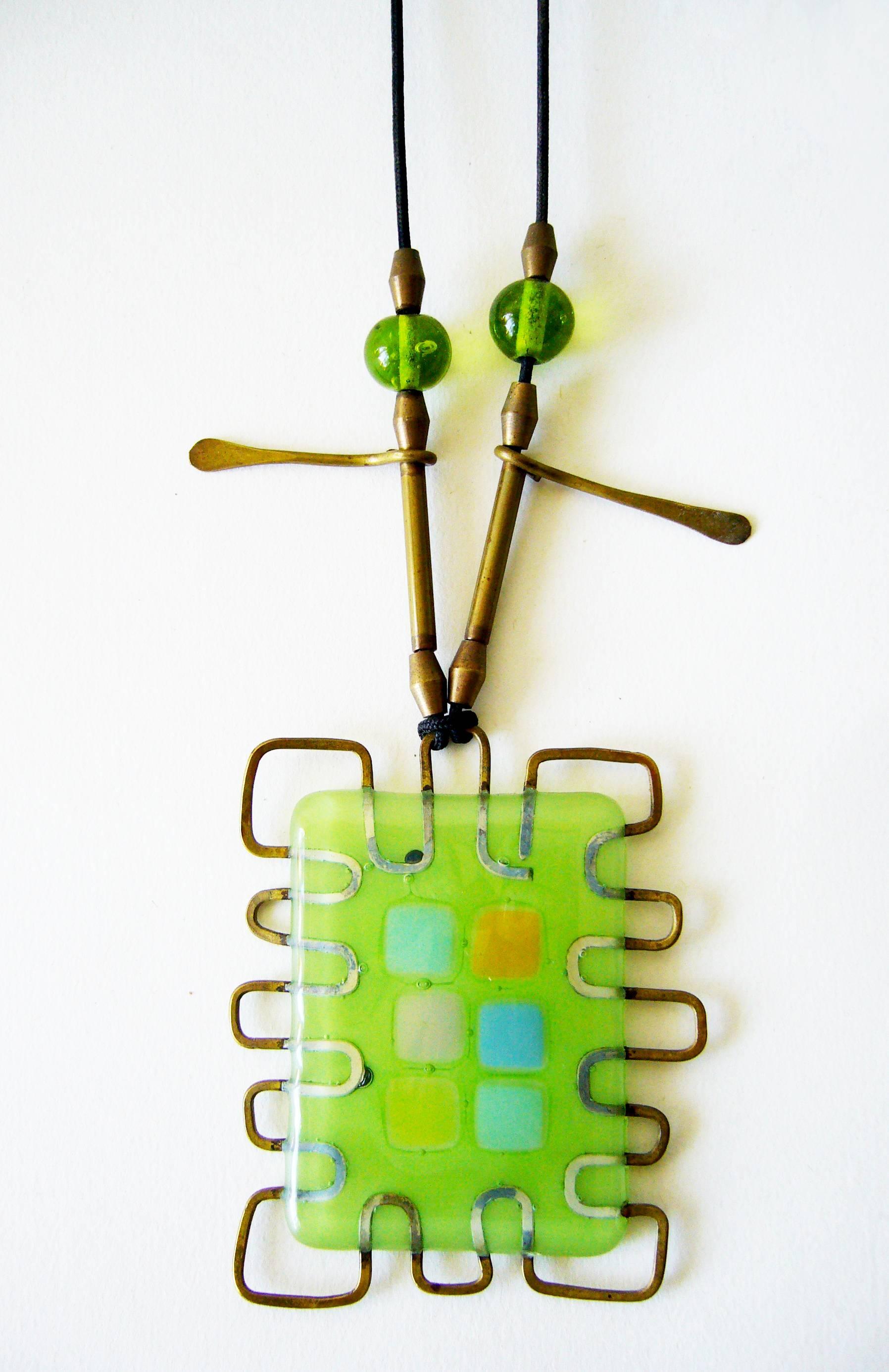 Frances and Michael Higgins Studio abstract and wire glass pendant, circa late 1990's.  Pendant measures 3