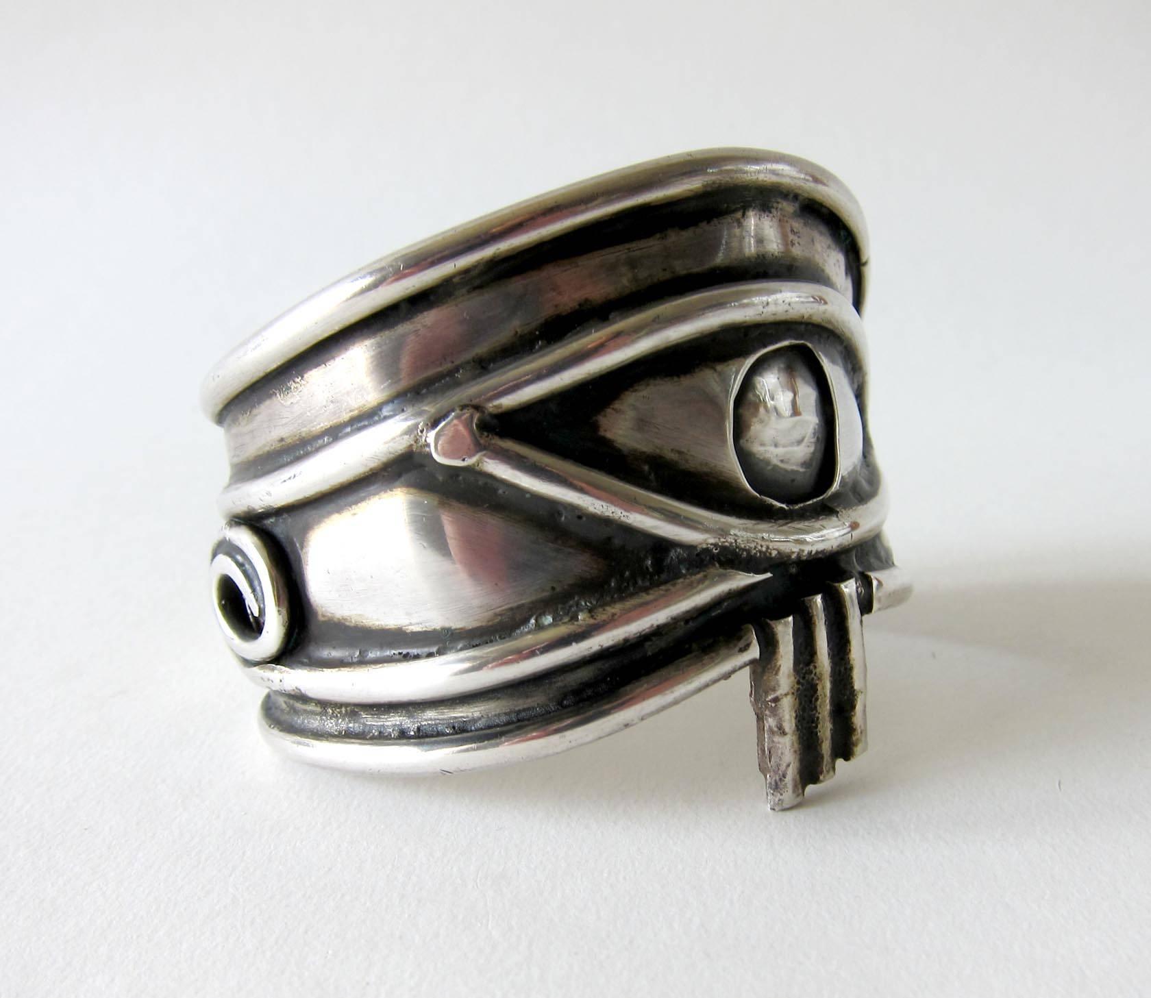 Handmade, sterling silver Eye of Ra bracelet circa 1970's.  Bracelet depicts the eye of the sun God, Ra and represents clairvoyance, omniscience, and a gateway into the soul.  It measures 7.5