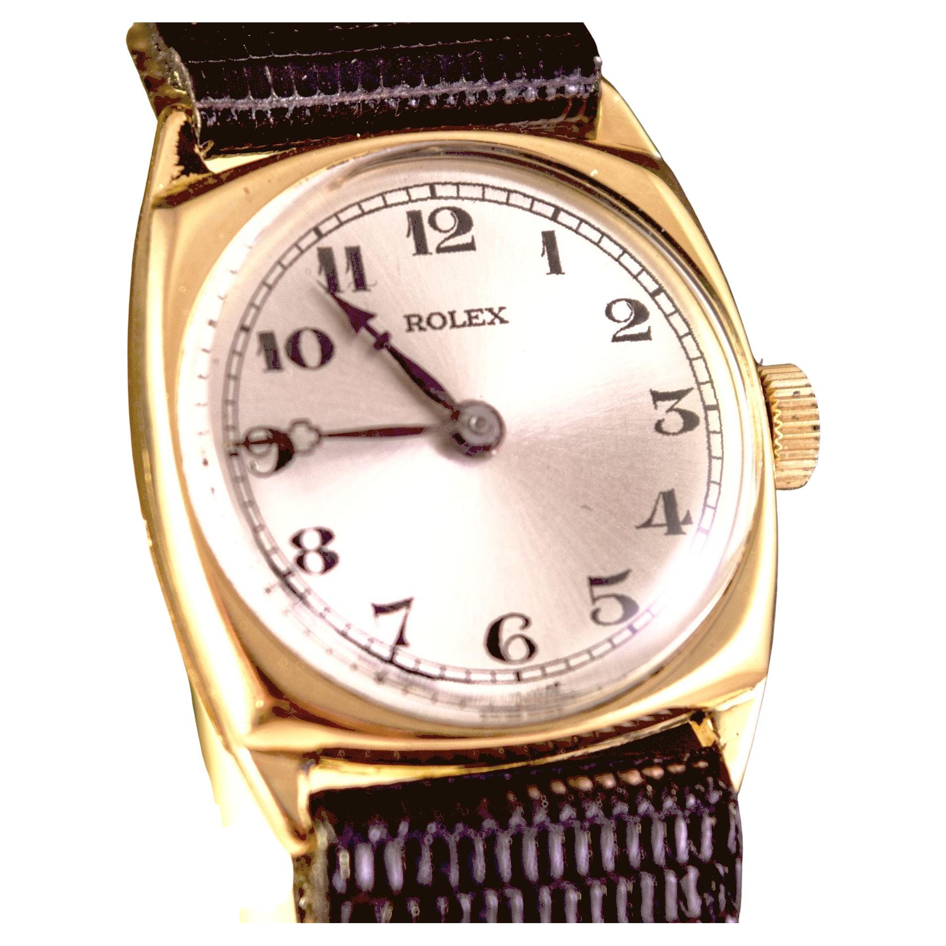Rolex Vintage rare Cushion shape 18 K gold.1930's
This is a lovely and rare cushion shaped watch in Solid 18 K gold Case.
Solid 18 K fixed lugs.
Dial is signed Rolex black numbers.
Attractive and rare blackened steel hands.
This watch comes with one