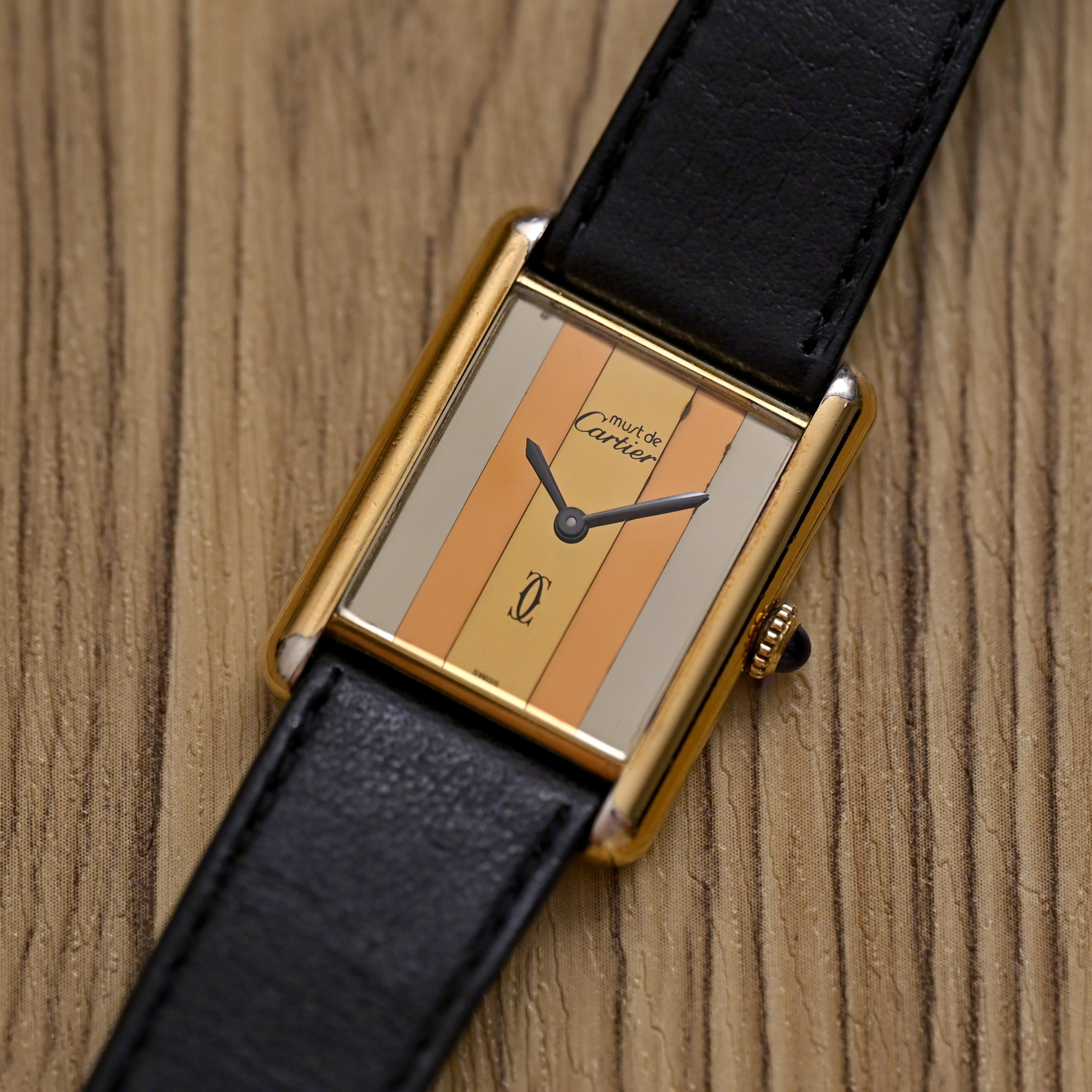 Must de Cartier Gold Plated 925 Tank Trinity Dial Manual Wind

Brand: Cartier
Year: 1990’s
Model: Must De Tank
Case number: 61xxxxx
Reference: C04722

Case: 23mm Gold Plated 925 Case shows sign of wear with slight polishing from previous

Dial: This