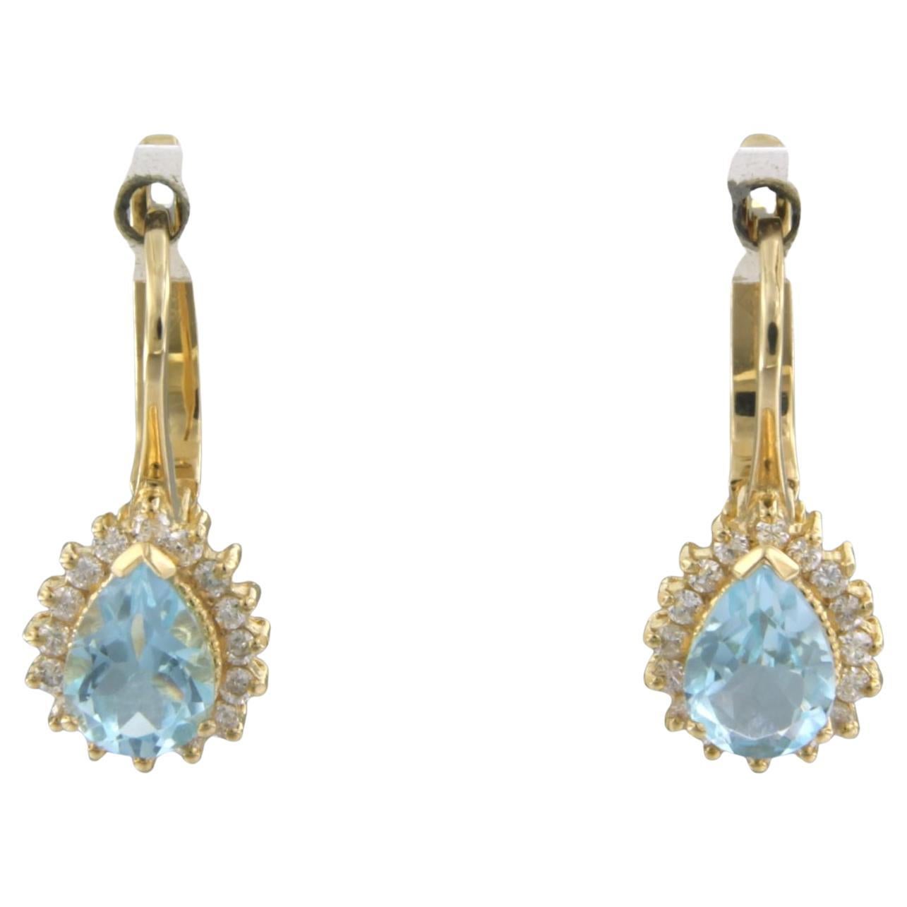 Earrings with topaz and brilliant cut diamonds up to 0.30ct 18k yellow gold