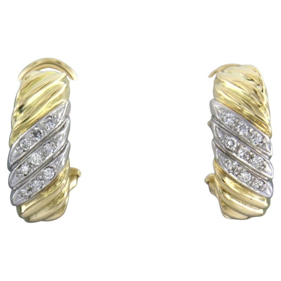 Boucle d'oreille avec diamants taille brillant jusqu'à 0.18ct 8.5 grammes Or bicolore 18k