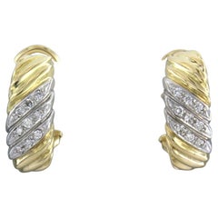 Boucle d'oreille avec diamants taille brillant jusqu'à 0.18ct 8.5 grammes Or bicolore 18k