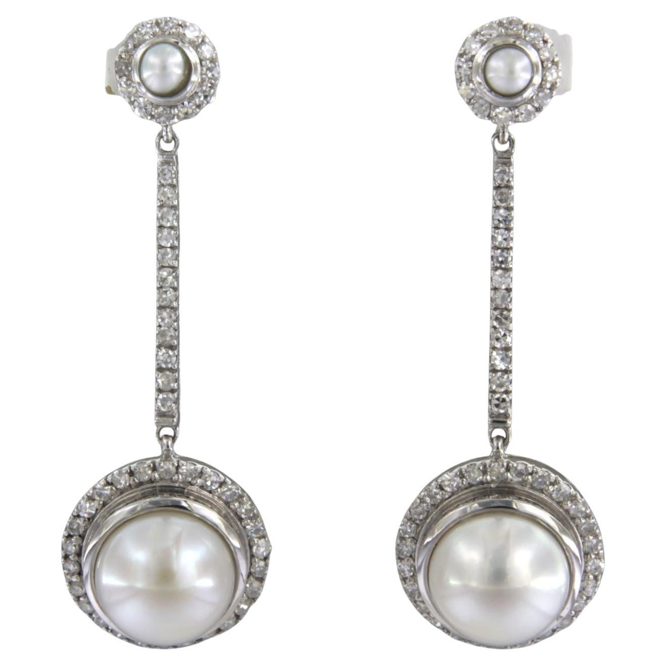 Boucles d'oreilles en or blanc 14 carats avec perles et diamants taille unique jusqu'à 0,82 carat en vente